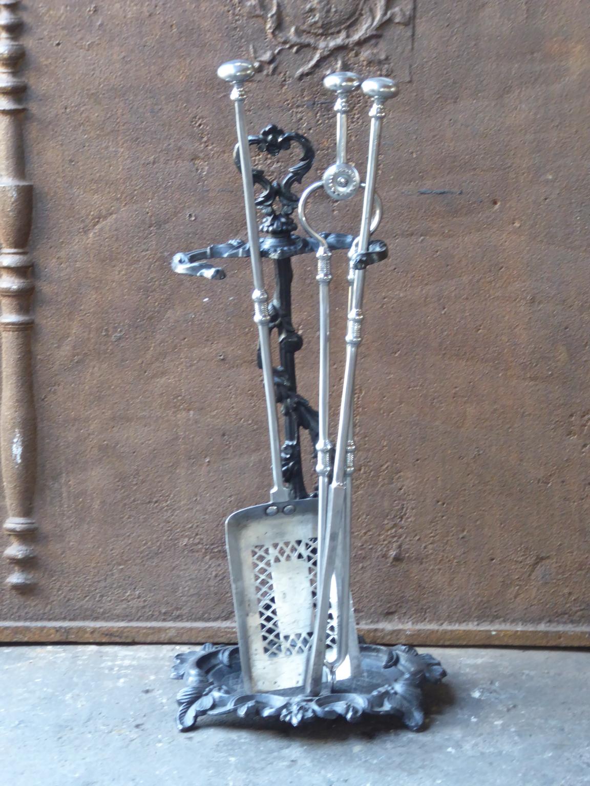 Beautiful English set of three fireplace tools made of polished steel with a cast iron stand. The fire tool set is in a good condition and is fully functional, 19th century, Victorian.







                  