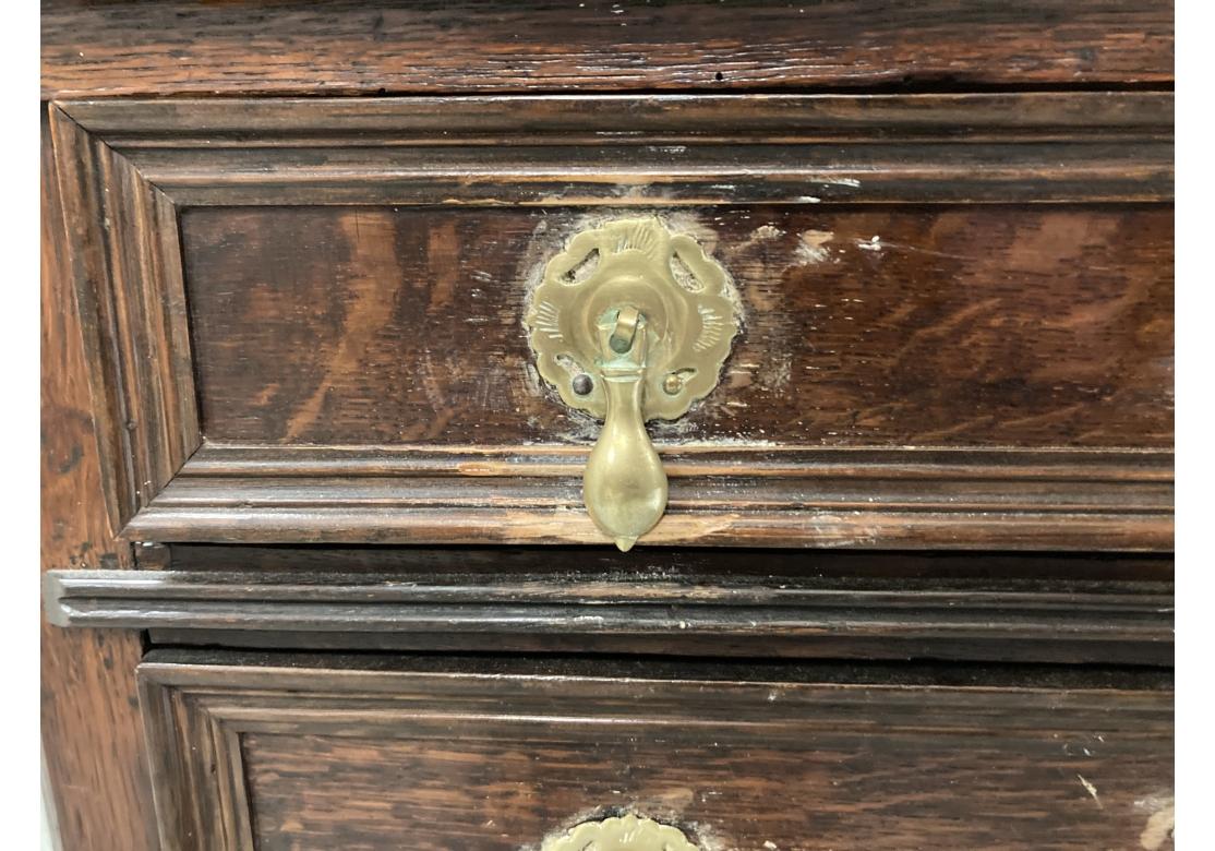 Antique English Five Drawer Oak Cabinet With Brass Pulls In Distressed Condition For Sale In Bridgeport, CT