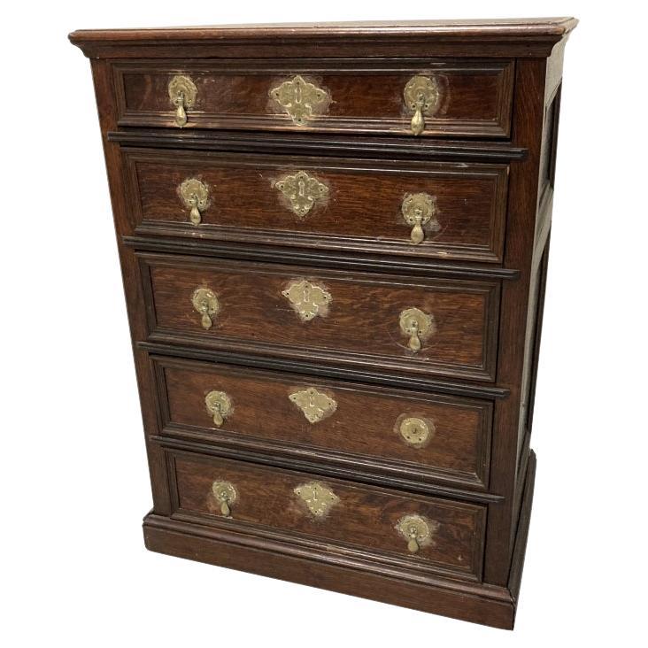 Antique English Five Drawer Oak Cabinet With Brass Pulls For Sale