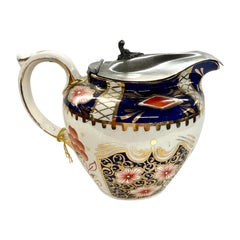 Antica brocca inglese con coperchio in terracotta e peltro con decori "olandesi o gallesi".