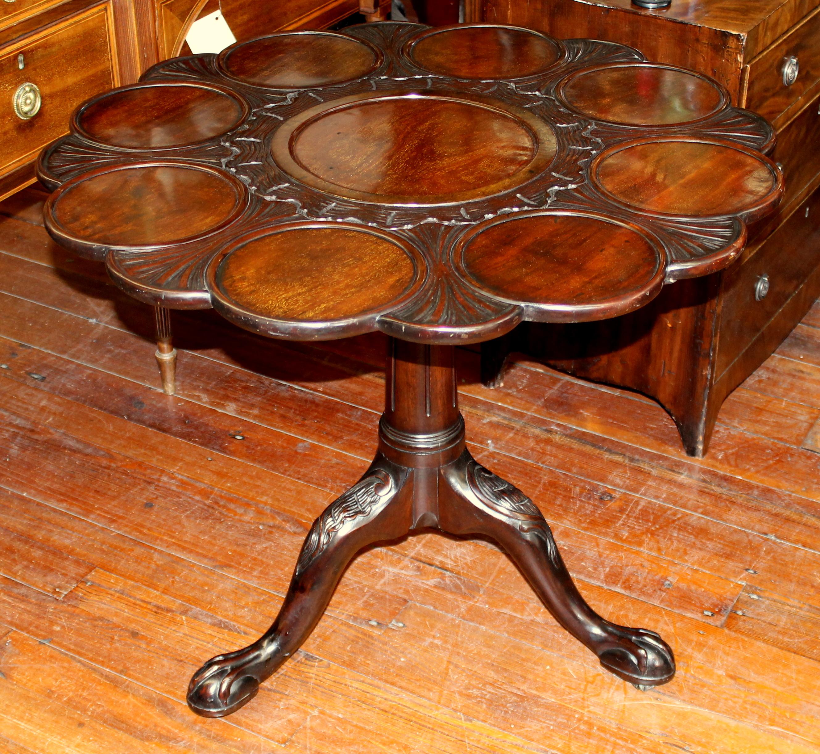 Finest quality antique English George III Chippendale style hand carved solid mahogany tilt-top supper Table with rare original hand-hewn mahogany birdcage support. Fabulous hand carved tilt-top supper Table with cabriole legs upon ball and claw pad