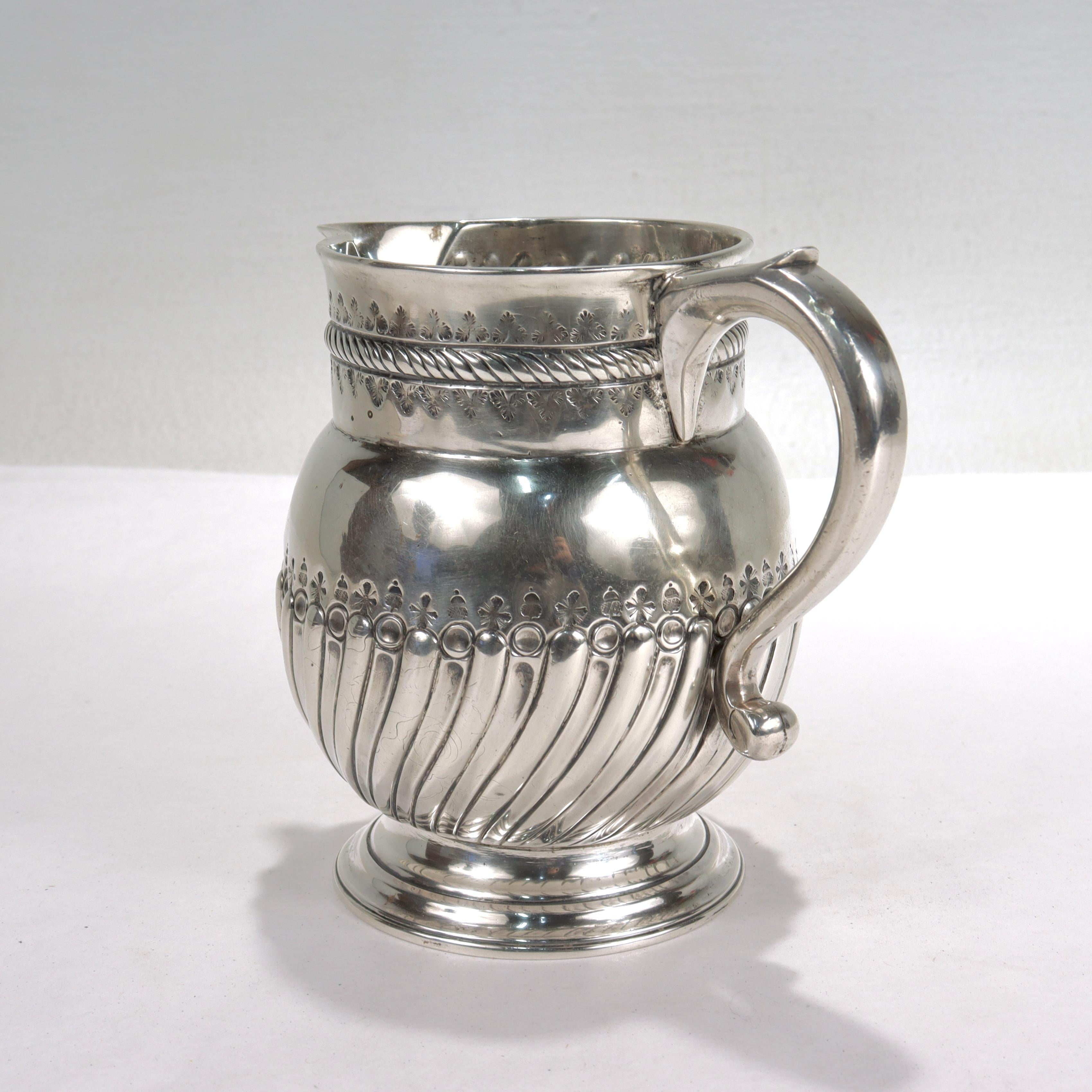 silver milk pitcher