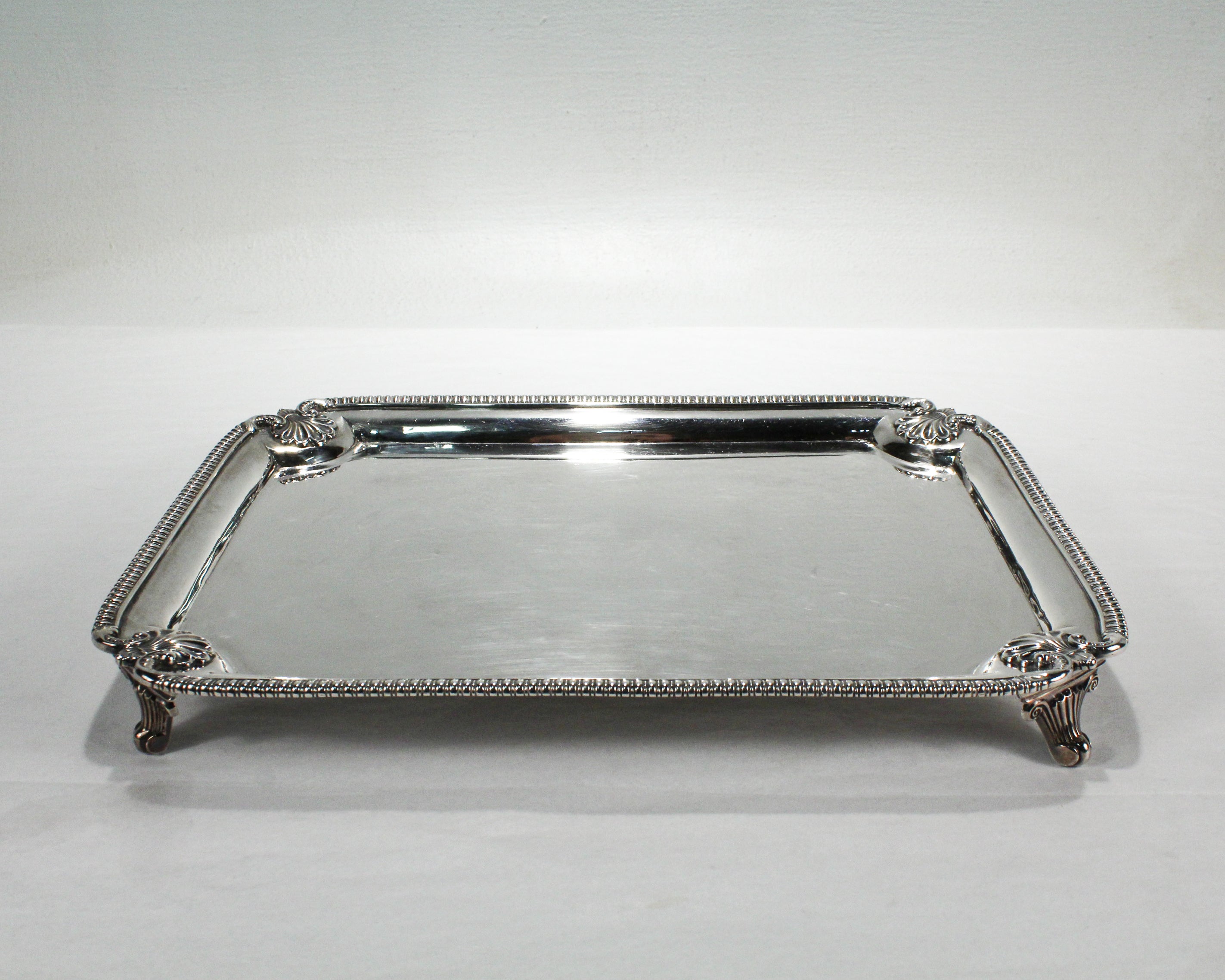 A fine antique silver salver or footed tray.

By Robert Hennell II and Samuel Hennell.

In sterling silver. 

Simply a great piece of antique English silver!

Date:
1810

Overall Condition:
It is in overall good, as-pictured, used estate