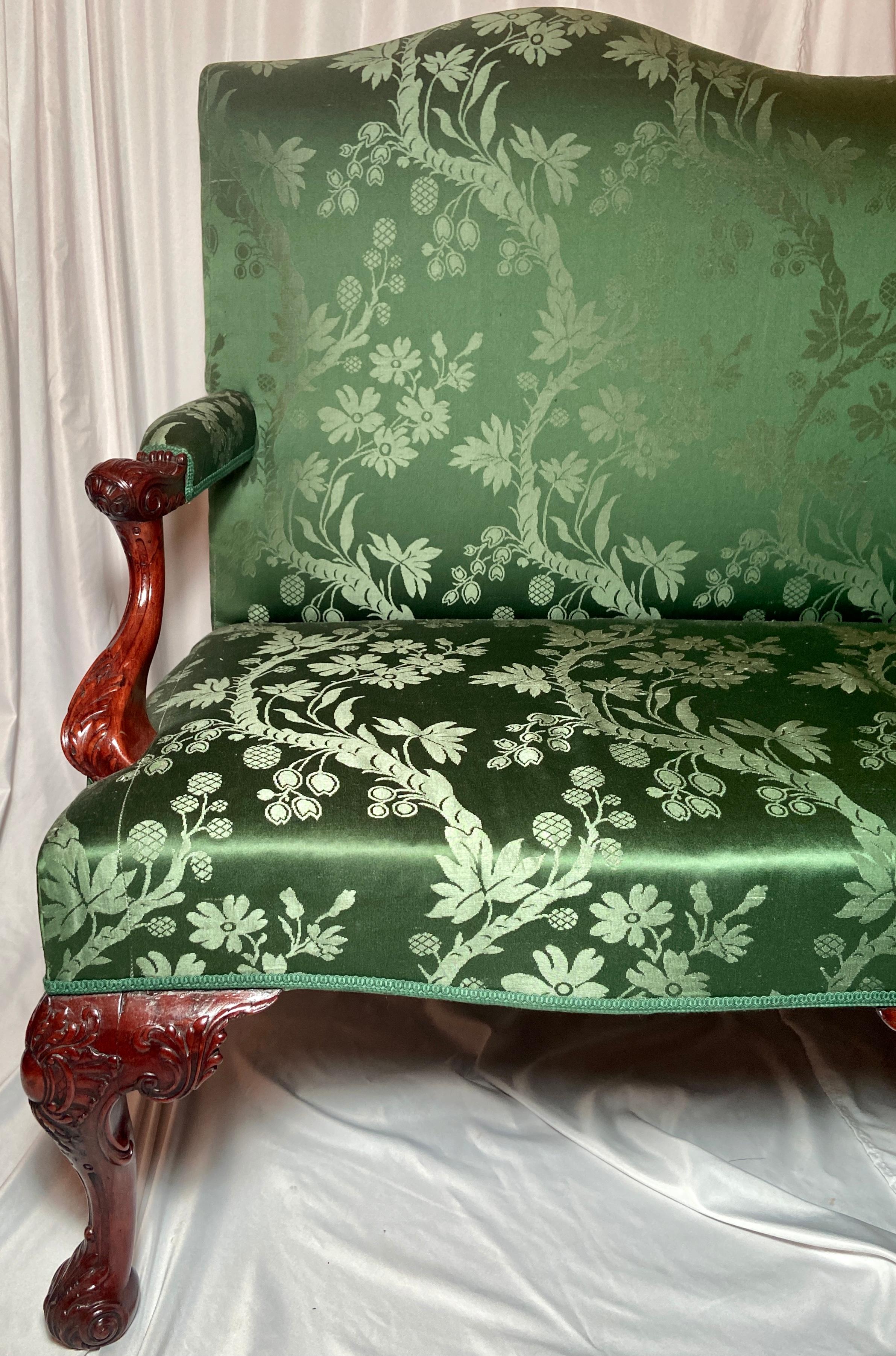 Antique English George III green upholstered mahogany settee, Circa 1790-1820. (New Upholstery).