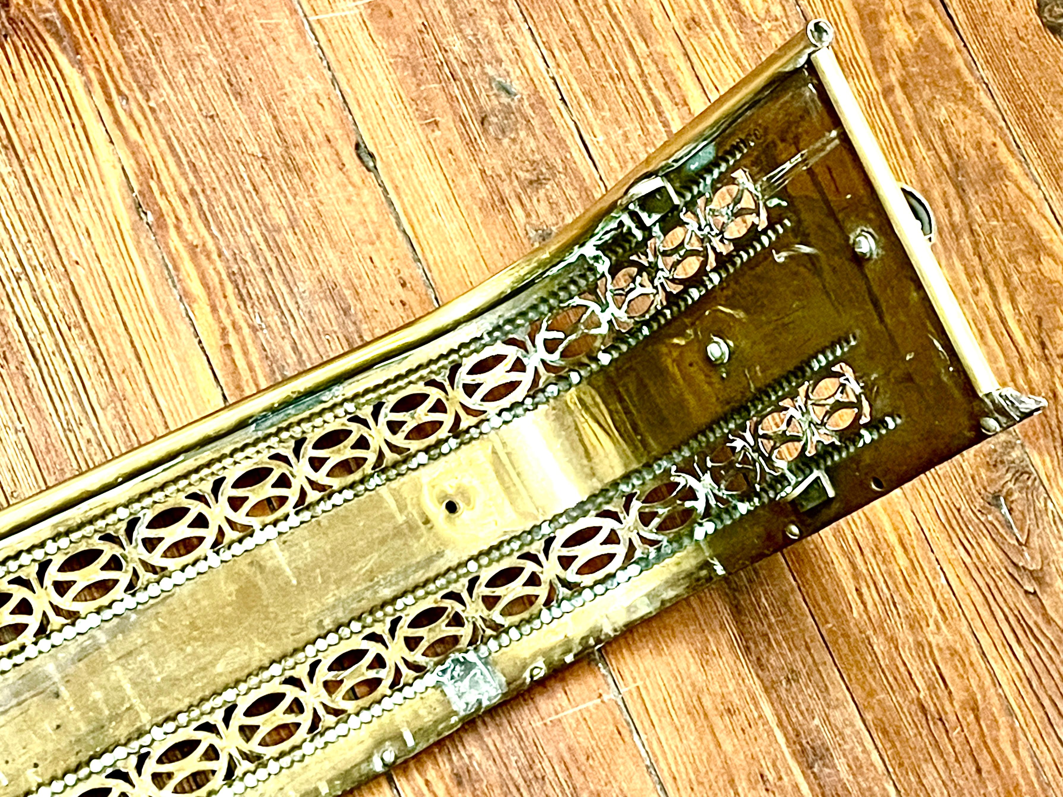 19th Century Antique English George III Intricately Pierced Brass Fireplace Fender For Sale