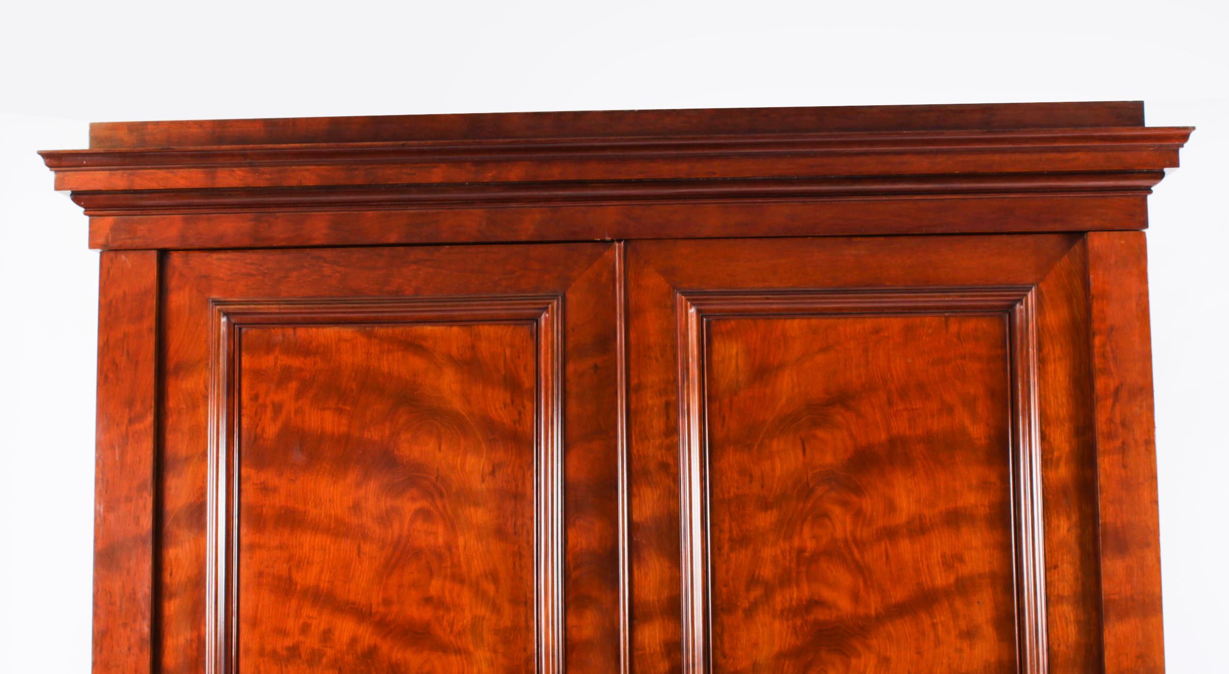British Antique English George IV Flame Mahogany Wardrobe 19th Century For Sale