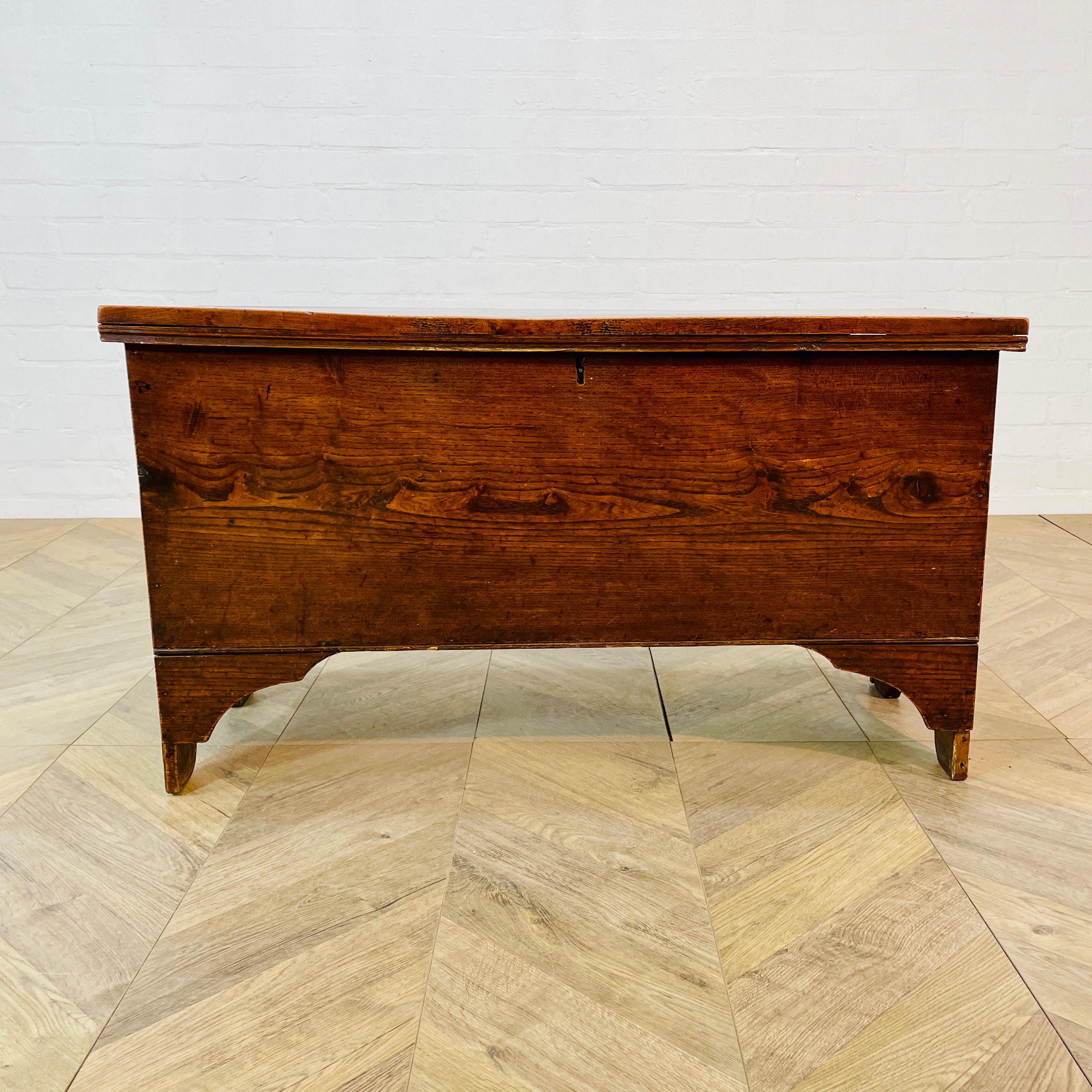 A Beautifully Simple English Antique Coffer or Trunk, circa 1830s.

The trunk, made from elm, has a a hinged lid and a good amount of storage inside.

In good antique condition, it does have general wear and scuffs in-keeping with its age and usage,