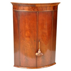 Antique English Georgian Flame Mahogany Bow-Fronted Corner Cabinet, circa 1780