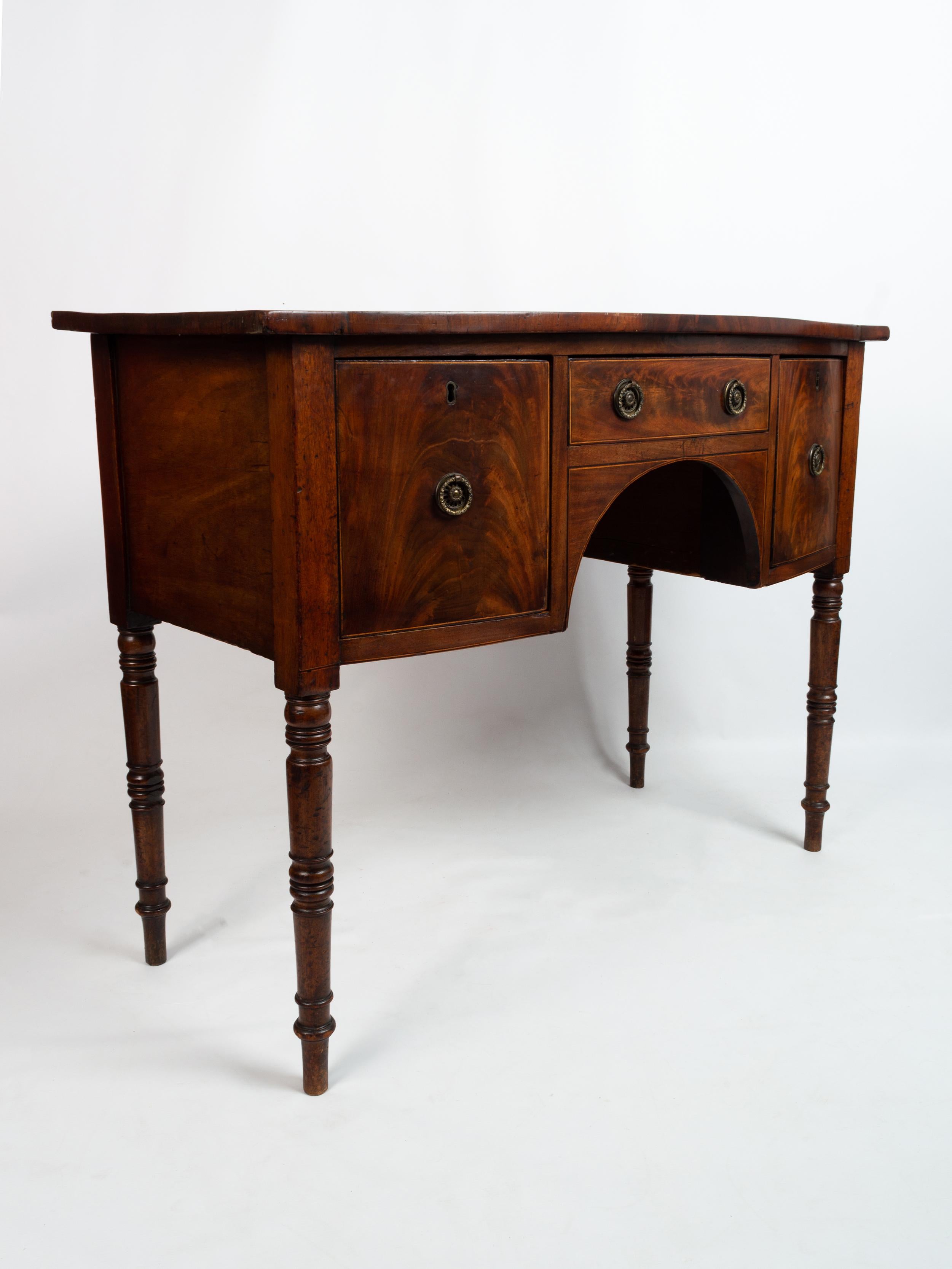Antique English Georgian Flame mahogany server console hall table. Circa. 1790 

George III mahogany sideboard, with a wonderful original patina and brass pull handles.

Neatly proportioned, ideal for a hallway or as a console table.
In very