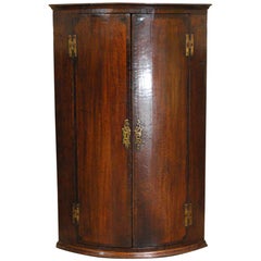 Used English Georgian Oak Hanging Bowfront Corner Cabinet