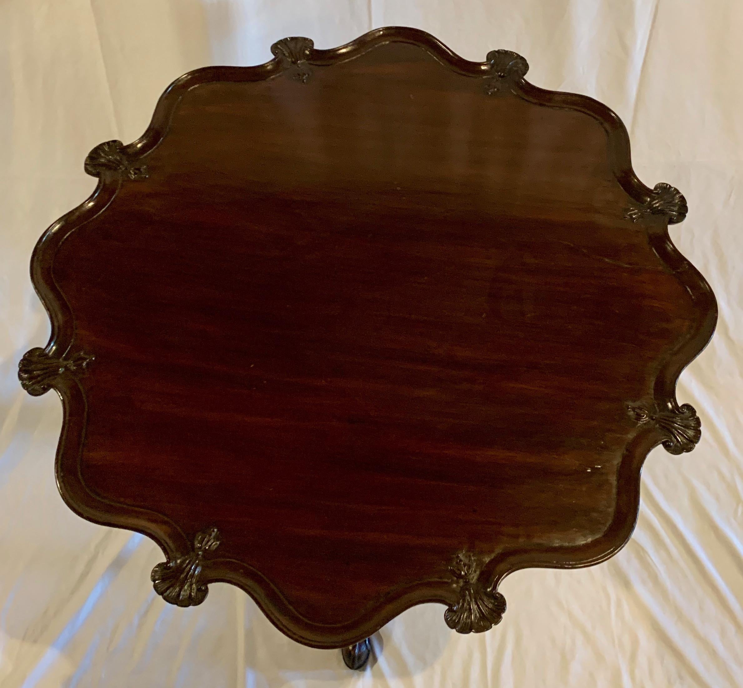 Antique English Georgian pie-crust mahogany table, circa 1810-1830.