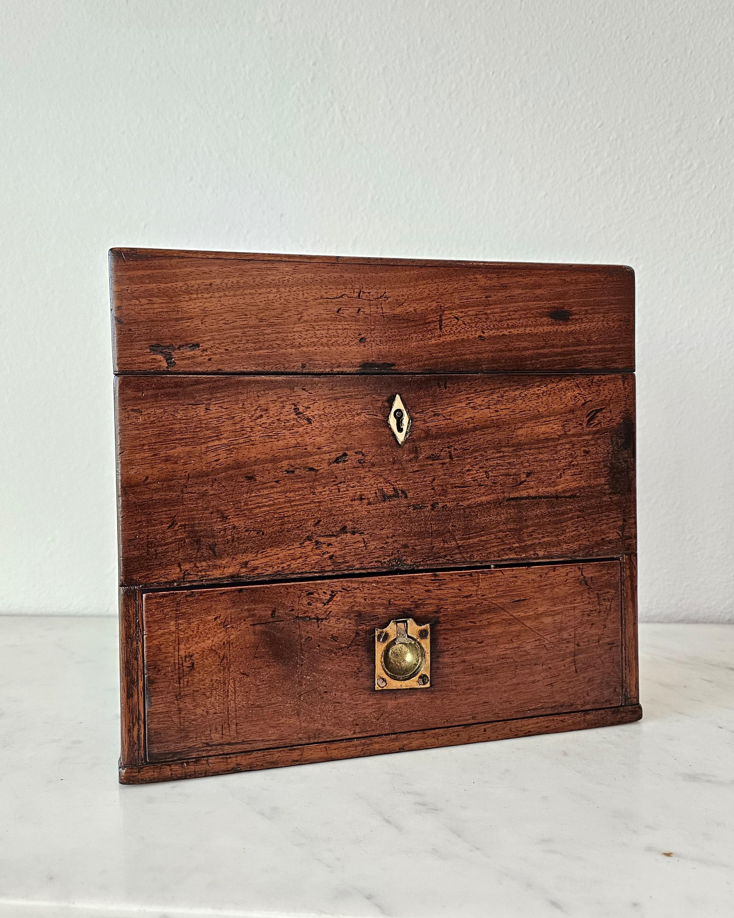 A scarce two-hundred year old period Georgian Regency era (1795-1837) traveling pharmacist / physician apothecary box with beautifully aged patina. circa 1810

Born in England in the late 18th / early 19th century, showcasing the refined elegant