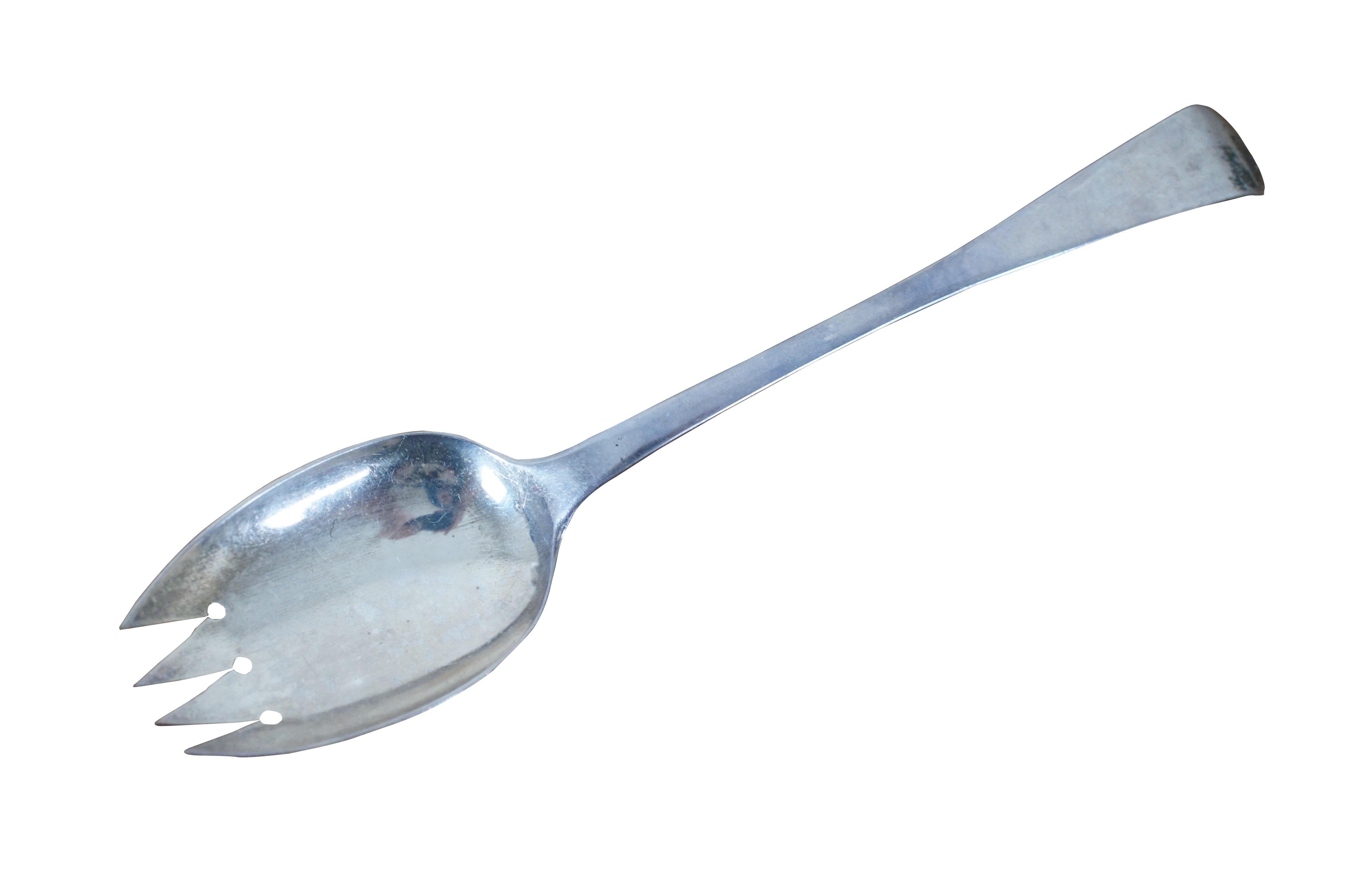 Antique English Georgian sterling silver “spork” shaped serving spoon or salad tosser tong. Attributed to H-H (Henry Holland) or H-J Henry Jeffreys, circa 1780s - 1830s, London England silversmiths.

Measures: 8.25” x 1.75” (length x width) /
