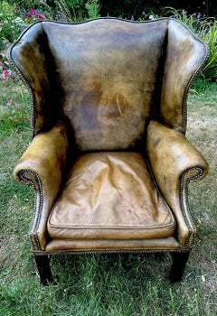 Antique English Georgian Style Distressed Tan Leather Wingback Library Armchair