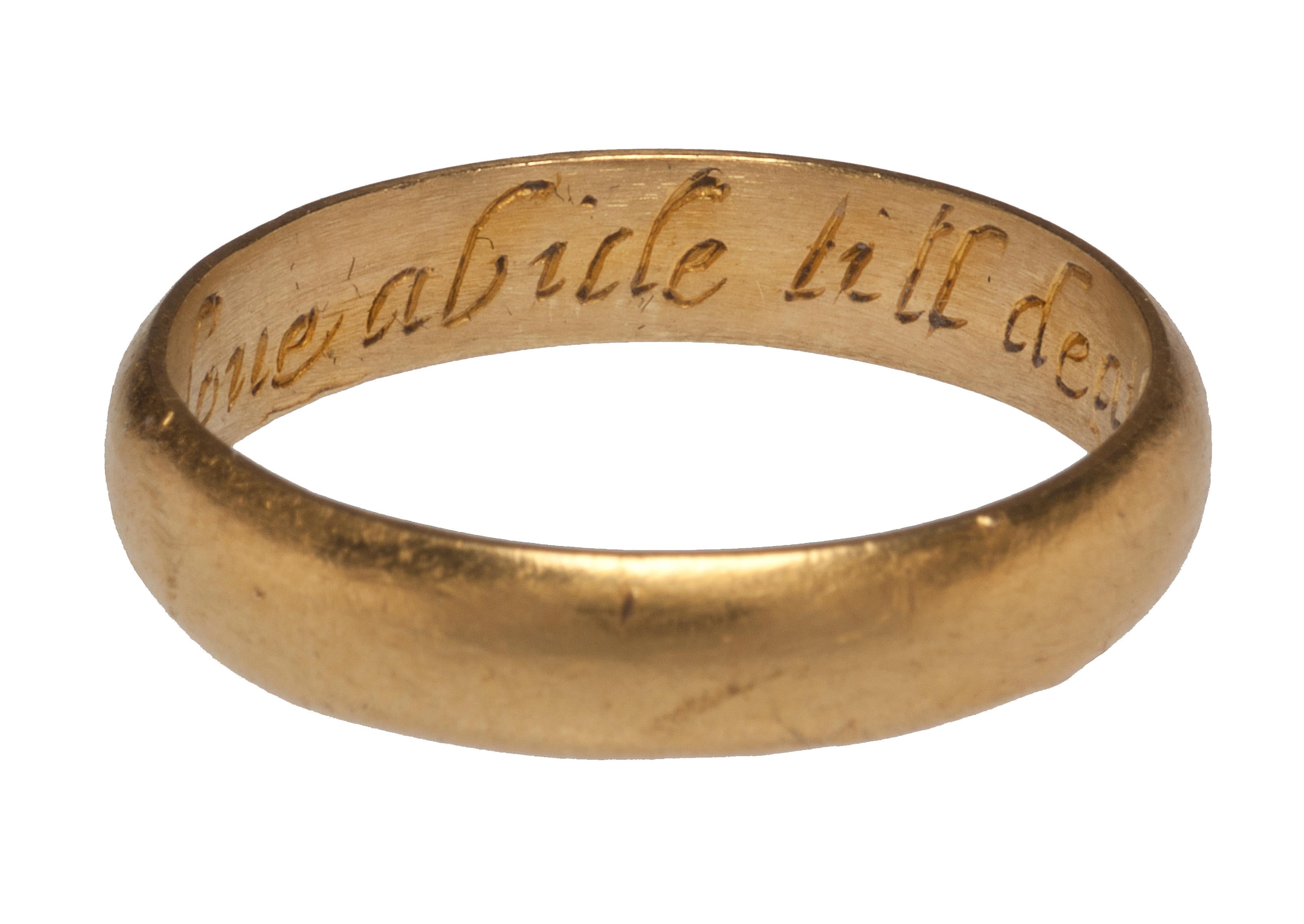 POSY RING “IN LOVE ABIDE TILL DEATH DEUIDE”
England, 17th century
Gold
Circumference 60 mm.; weight 5.2 gr.; US size 9 ¼ ; UK size S

The plain hoop, flat on the interior and rounded on the exterior, is engraved on the inside with the inscription