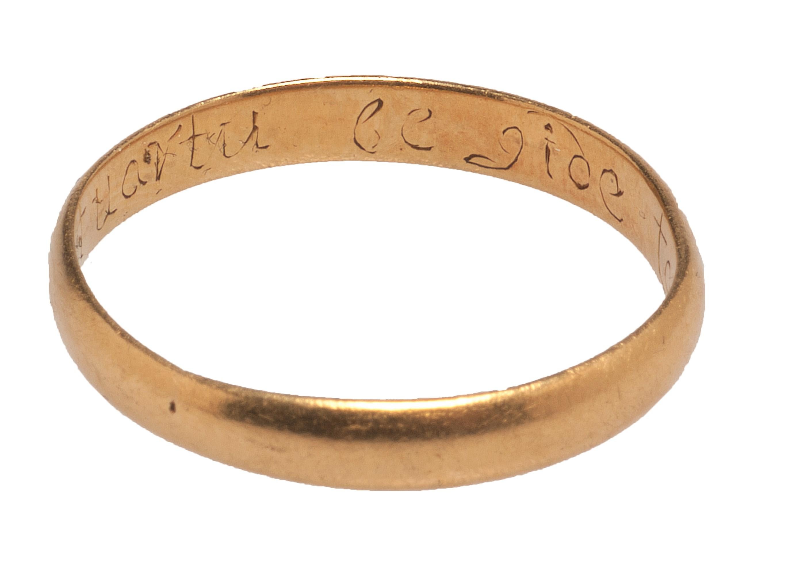 POSY RING “LET UARTU BE GIDE TO THE” 
England, 17th Century 
Gold 
Weight 3.1g; circumference: 60.1mm ;  size: US 9.25, UK S 

Medium hoop, with rounded exterior and flat interior. Italic inscription reads: “Let uartu be gide to the.” A maker’s