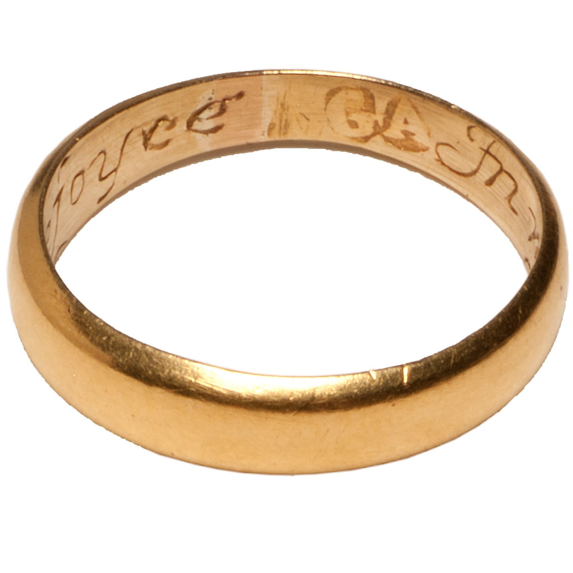 POSY RING “IN MY CHOYCE I DO REJOYCE” 
England, 17th century 
Gold 
Weight: 3g; circumference: 50.3 mm; size: US 5.5, UK L 

Substantial hoop for a small ring. Rounded exterior and flat interior tapering at the base. The interior is engraved with