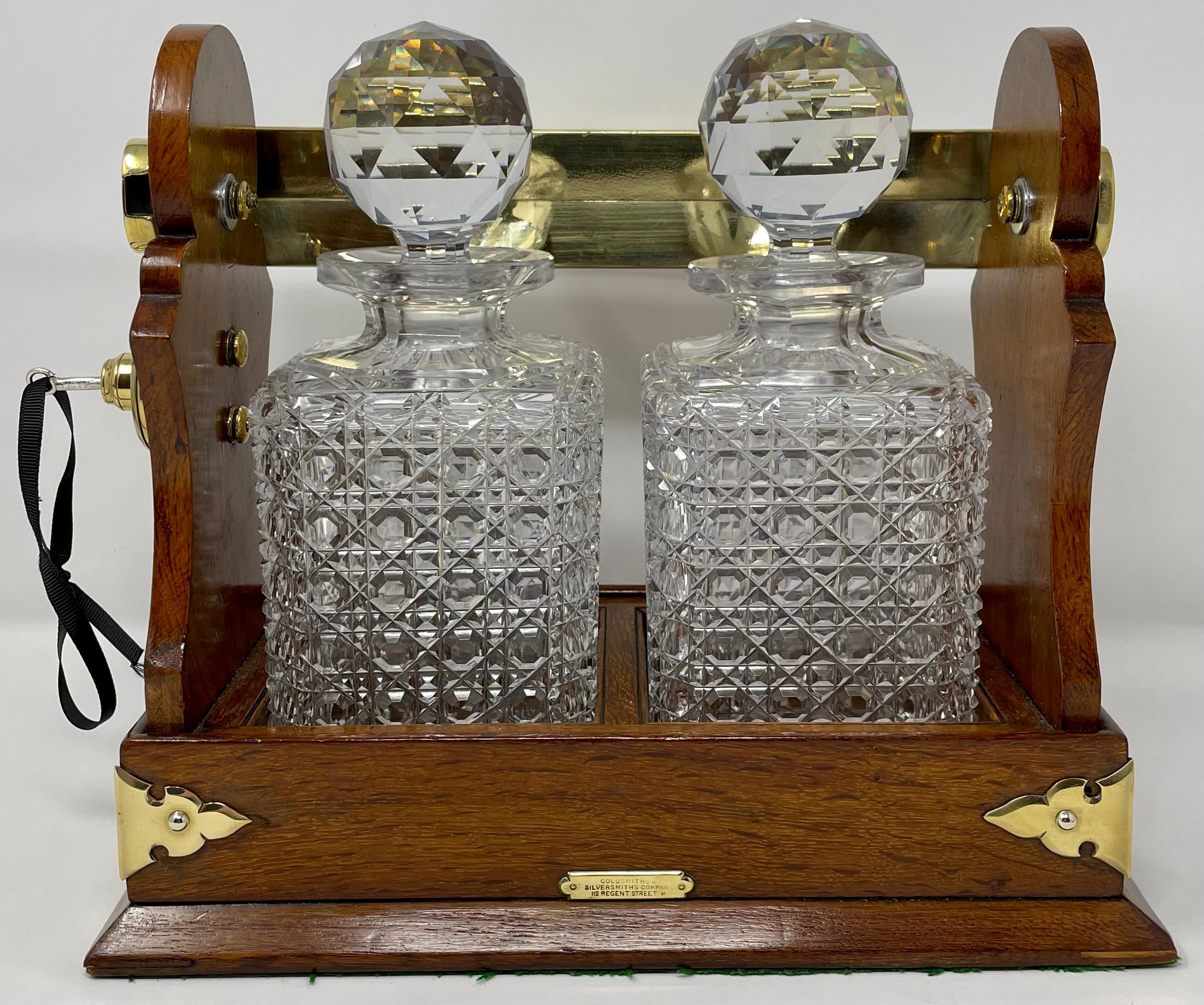 19th Century Antique English Golden Oak & Cut Crystal Two-Bottle Tantalus, Circa 1890.