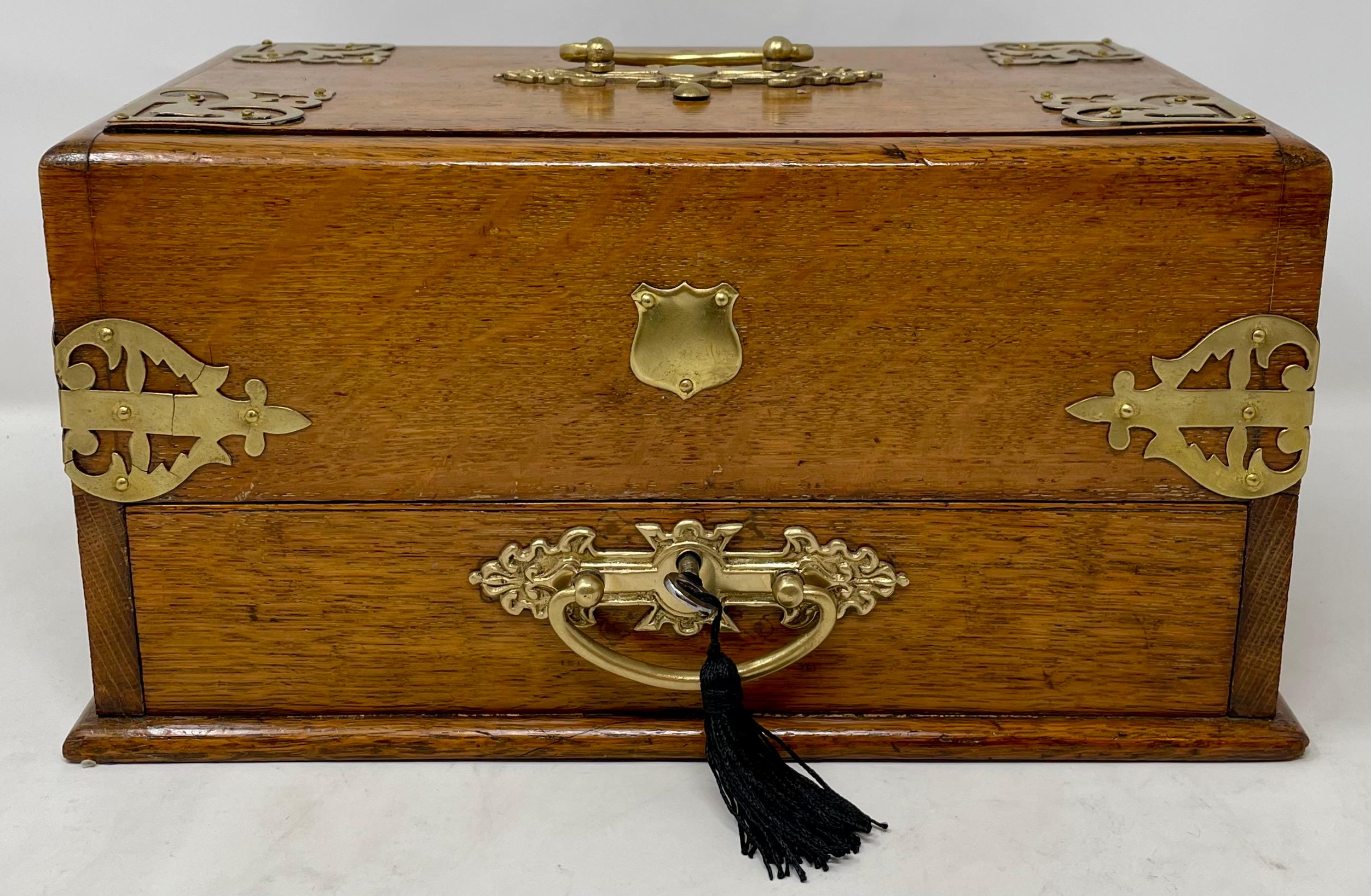 Antique English golden oak mechanical smoker's box, circa 1890's.