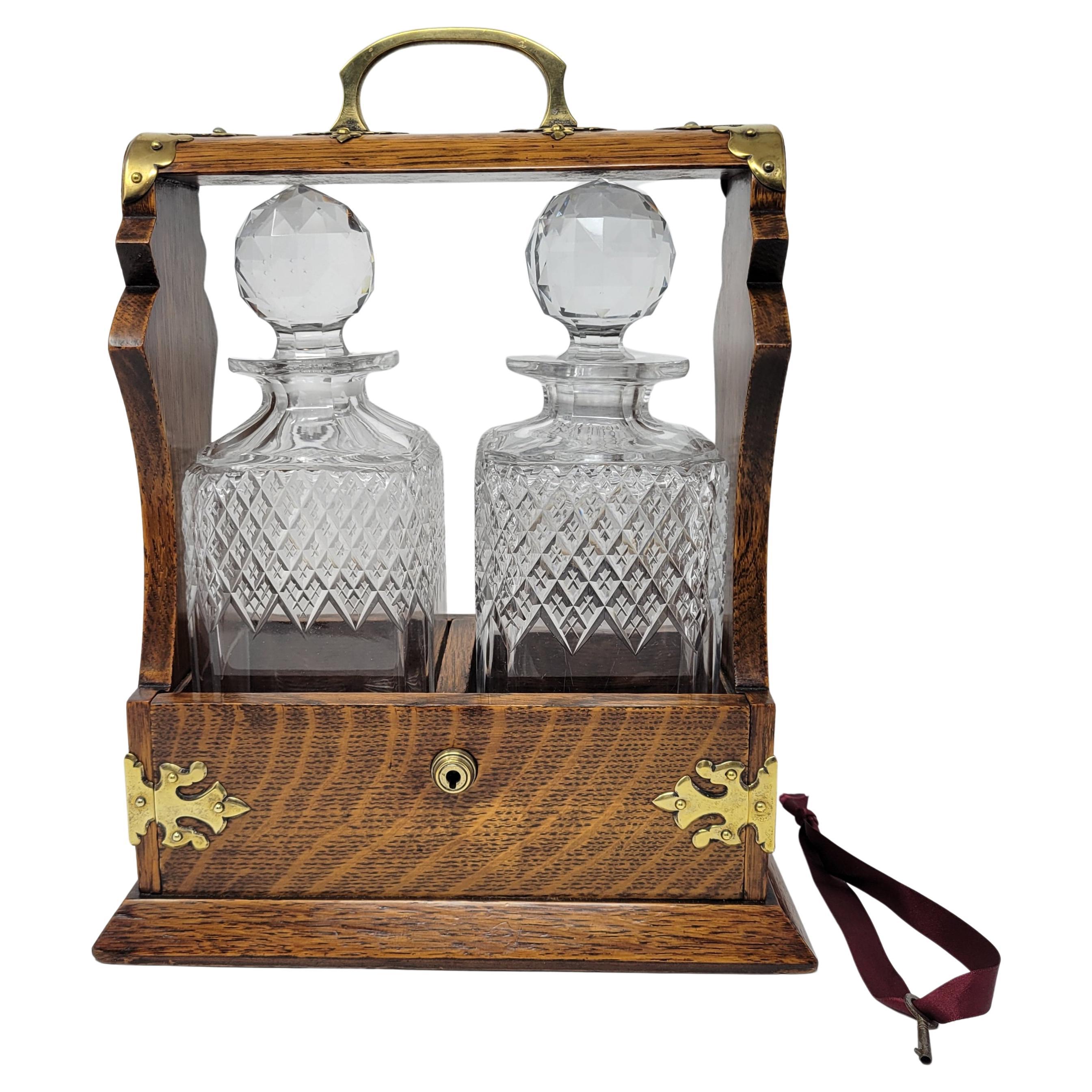 Antique English Golden Oak Two Bottle Tantalus For Sale