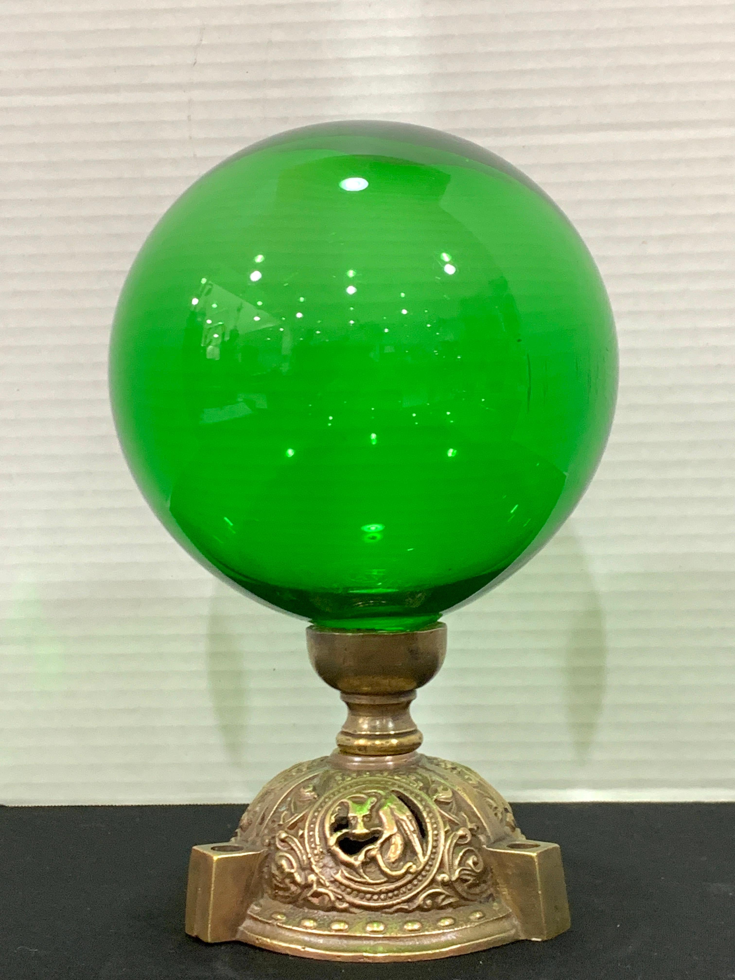 Antique English Gothic emerald green glass bronze mounted newel post, circa 1890, of rare large size standing 11