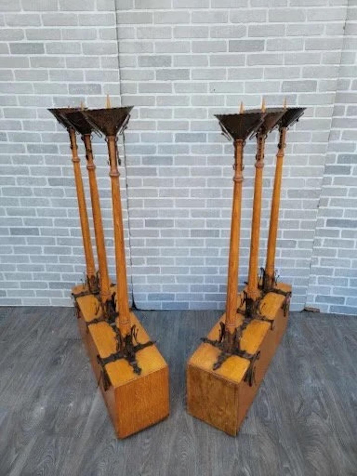 Antique English Gothic Removable Candle Torch Set - Pair

This set includes two identical candlestick holders mounted on sturdy carved wood. Each candlestick holder has space for three candlesticks. The posts that come with the set are entirely