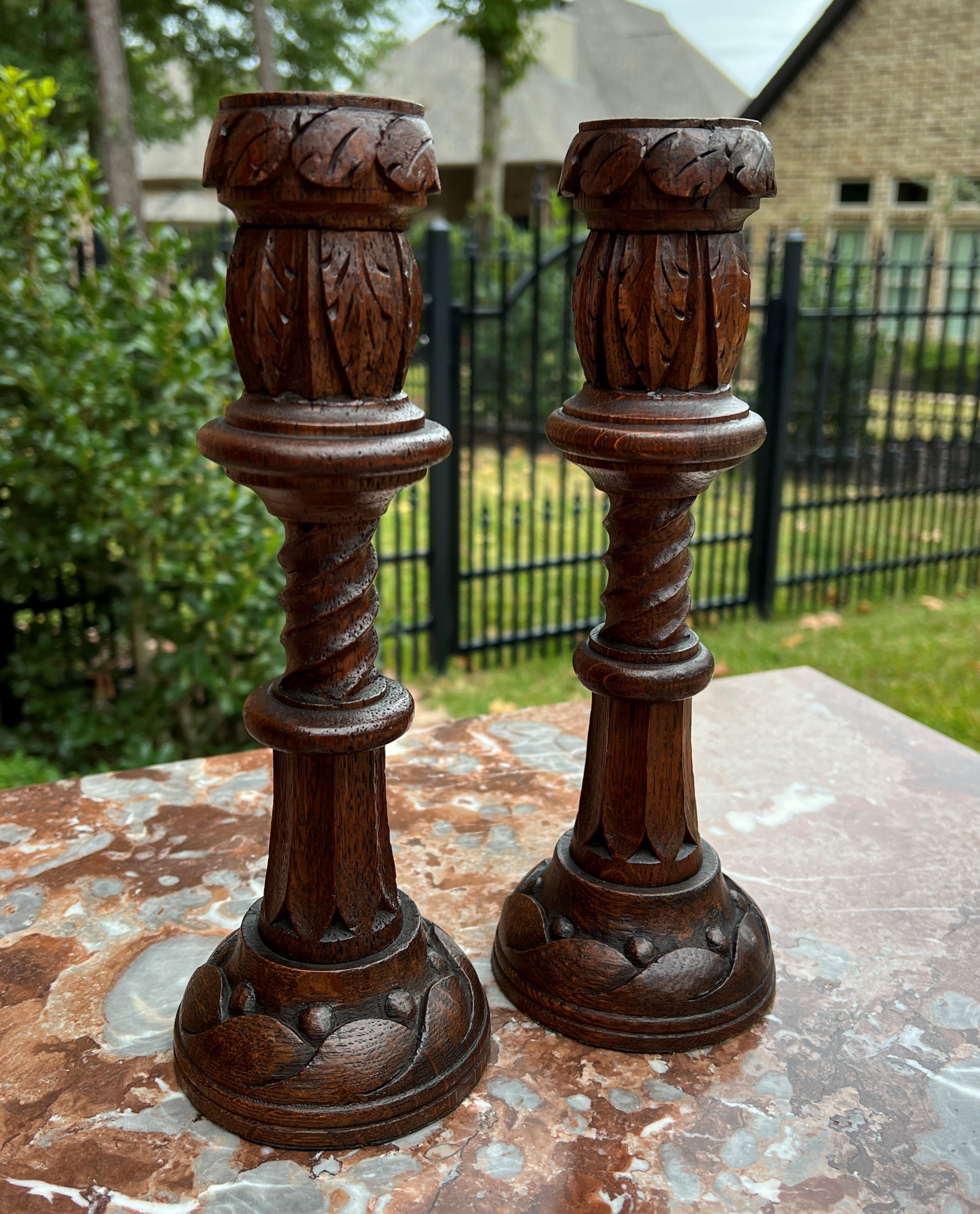 Charming pair of antique English oak gothic revival candlesticks candle holders with brass inset cups c. 1920s

Sturdy and stable oak

Measures: 11.25
