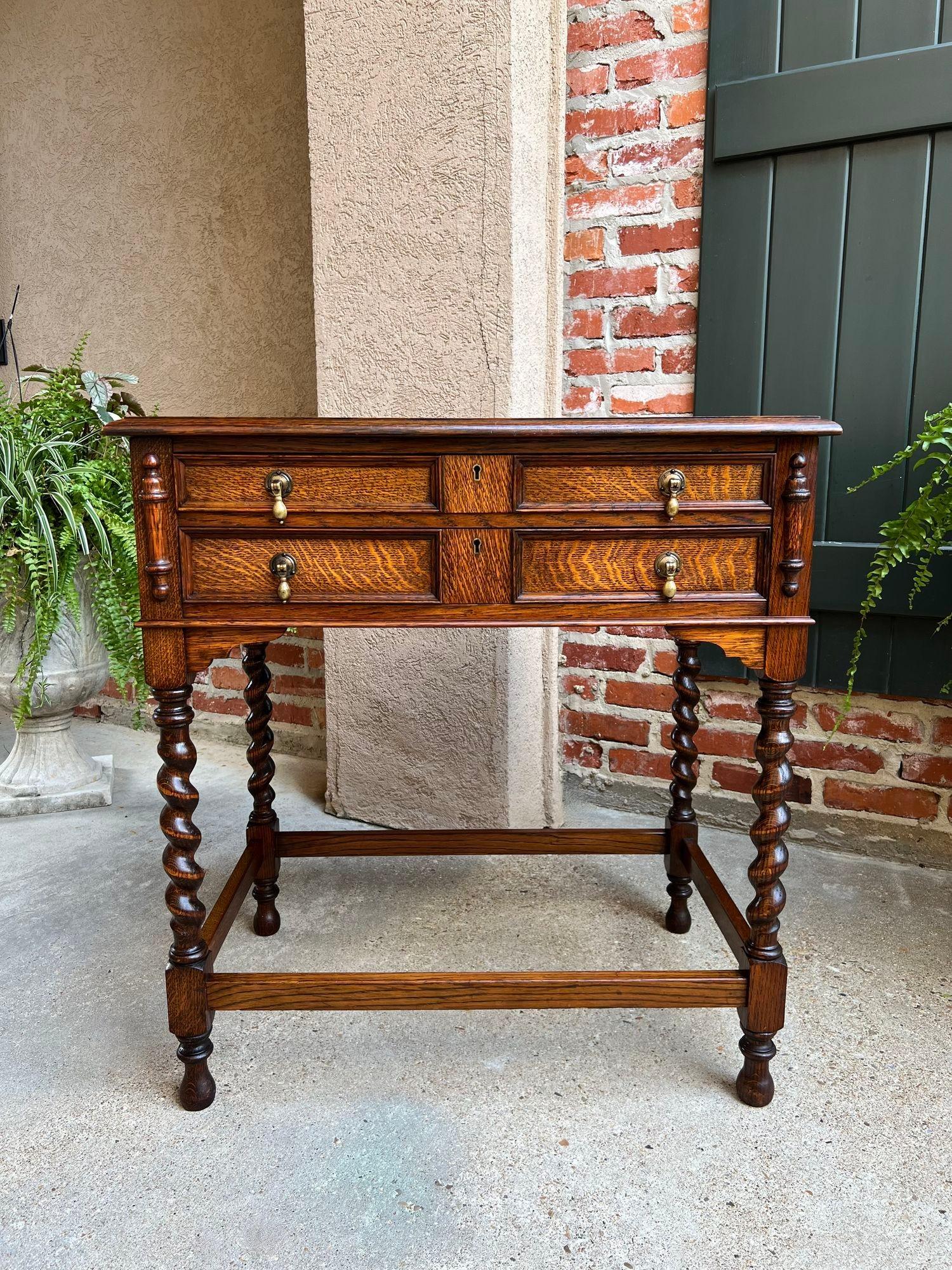 Antique English Hall Table Cutlery Chest Cabinet Barley Twist Jacobean Tiger Oak.

Direct from England, a beautiful side table in lovely Jacobean style! With gorgeous British tiger oak, the table features two full length drawers with paneled fronts,
