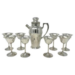 Antico set da cocktail inglese in argento martellato con 9 pezzi, anni '20 circa.
