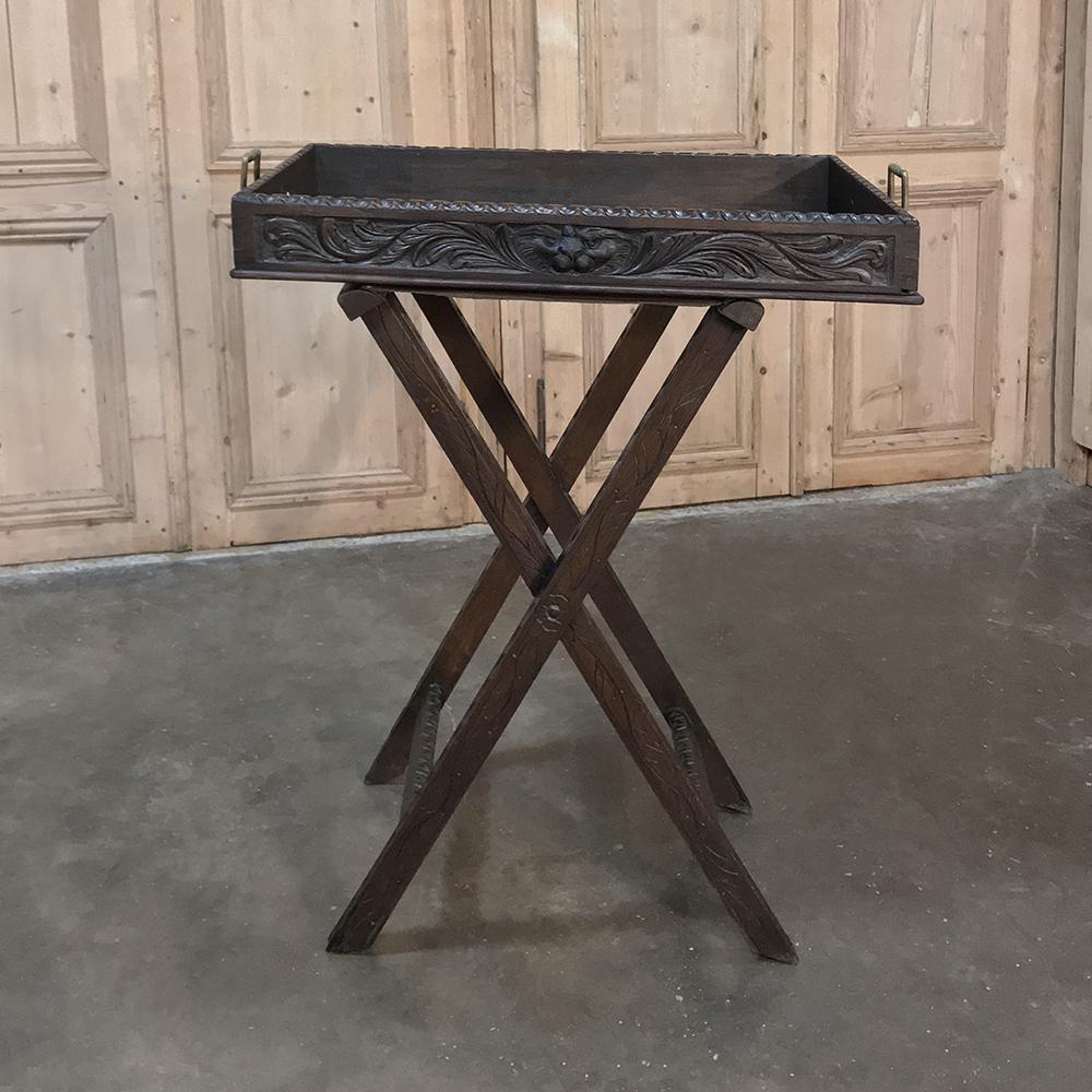 Antique English hand-carved butler's table -tray features a folding stand that tucks out of the way when not in use, plus a generously sized carved wood tray for serving delectables in style!
circa early 1900s
Measures 38 H x 33 W x 20.5 D.