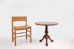 Antique English hand carved circular oak side table with lions head feet