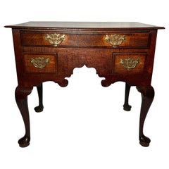 Antique English Hand-Carved Oak Lowboy, Circa 1820.