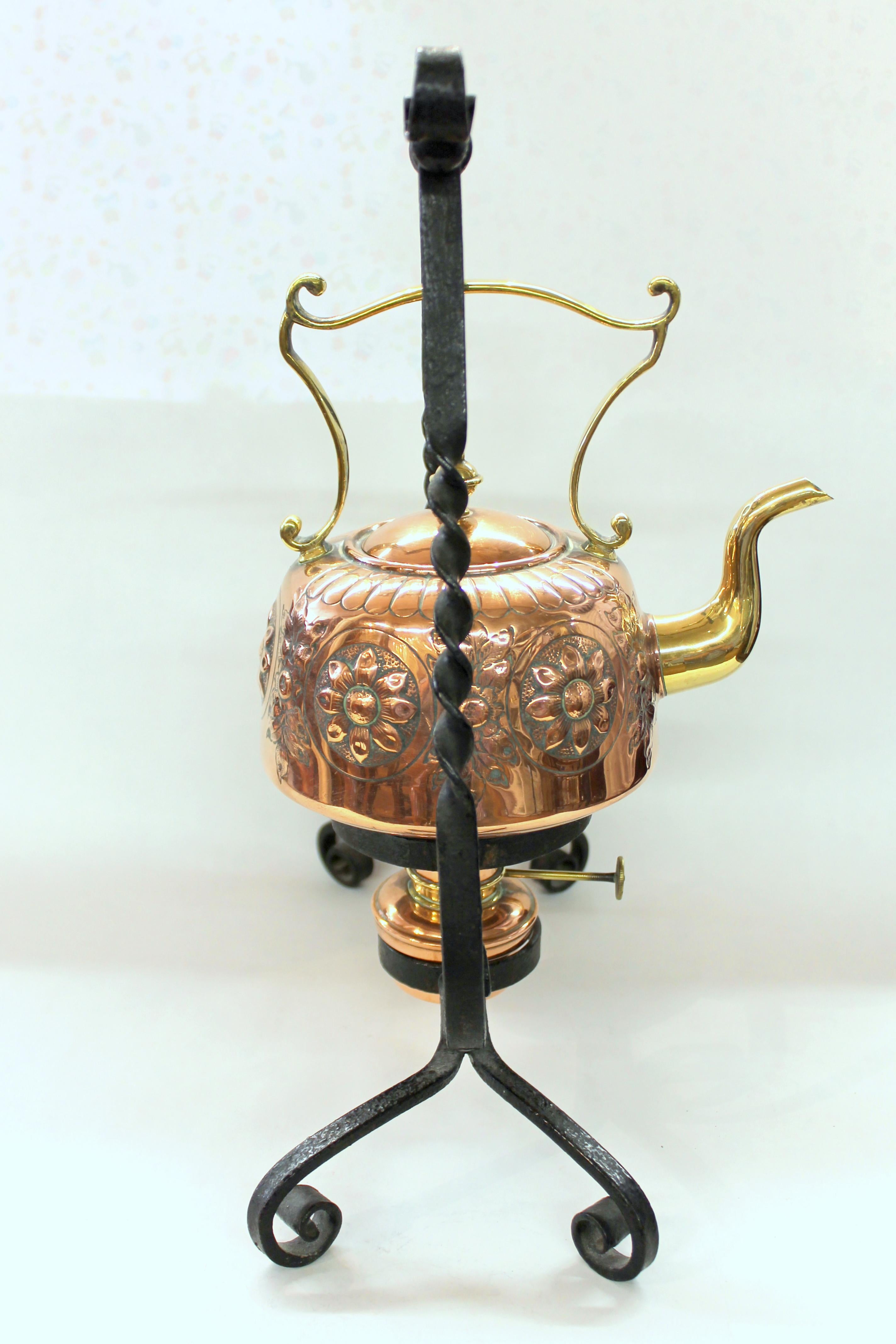 Antique English Hand Chased Copper and Brass Kettle on Wrought Iron Stand In Good Condition In Charleston, SC