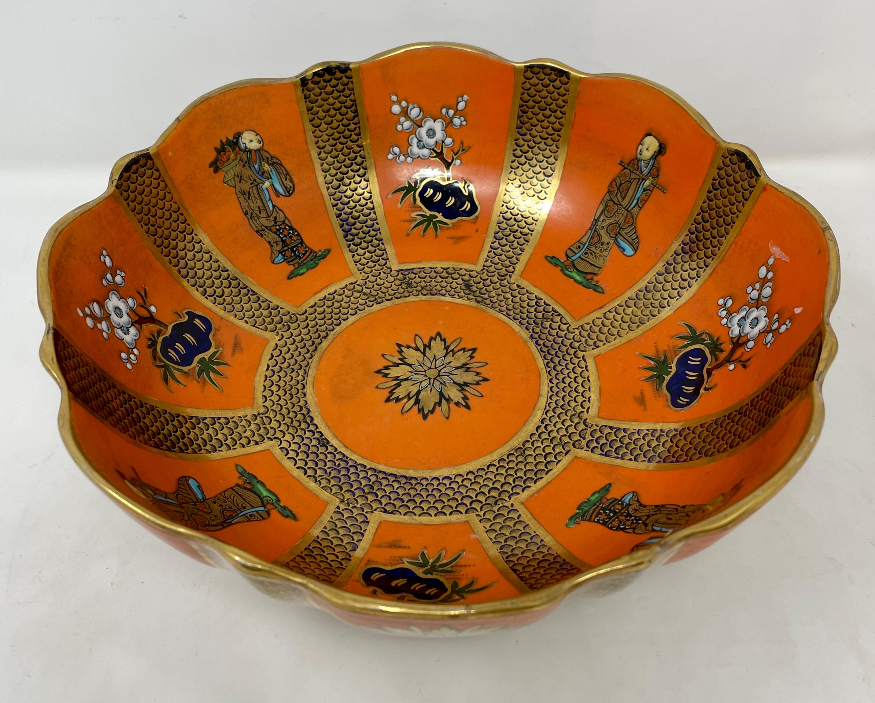 Antique English hand painted persimmon ironstone bowl, circa 1910-1920.