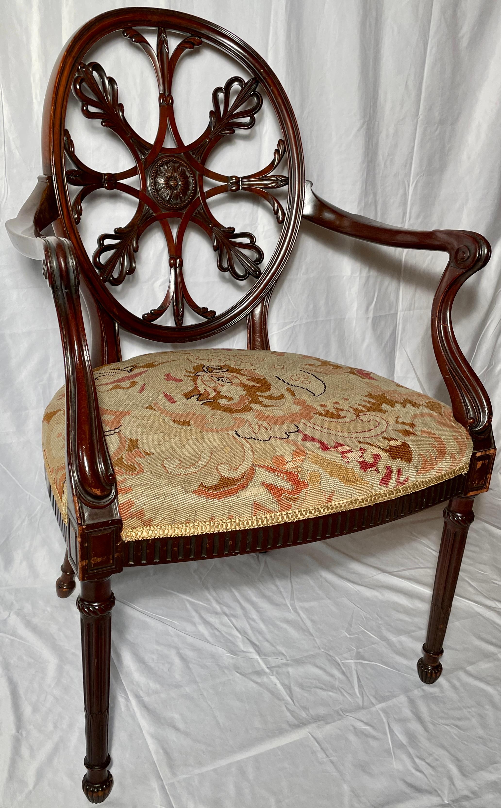 Antique English Hepplewhite round back arm chair, circa 1880.
