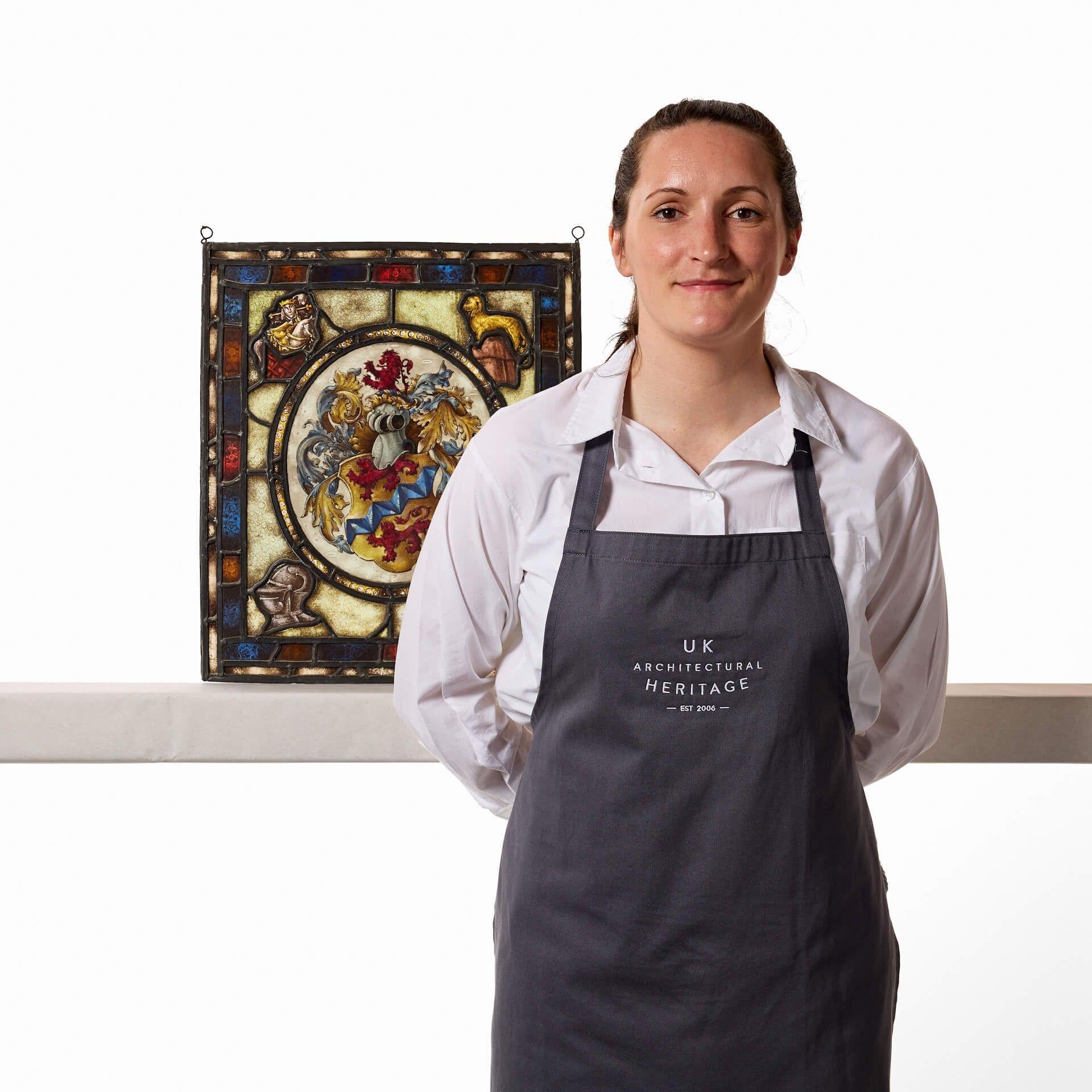 A fascinating early 19th century English heraldic stained glass window detailing an unidentified family crest, circa 1820. Dating from the Georgian era, this stunning stained glass window is over 200 years old. The central crest, depicting a yellow