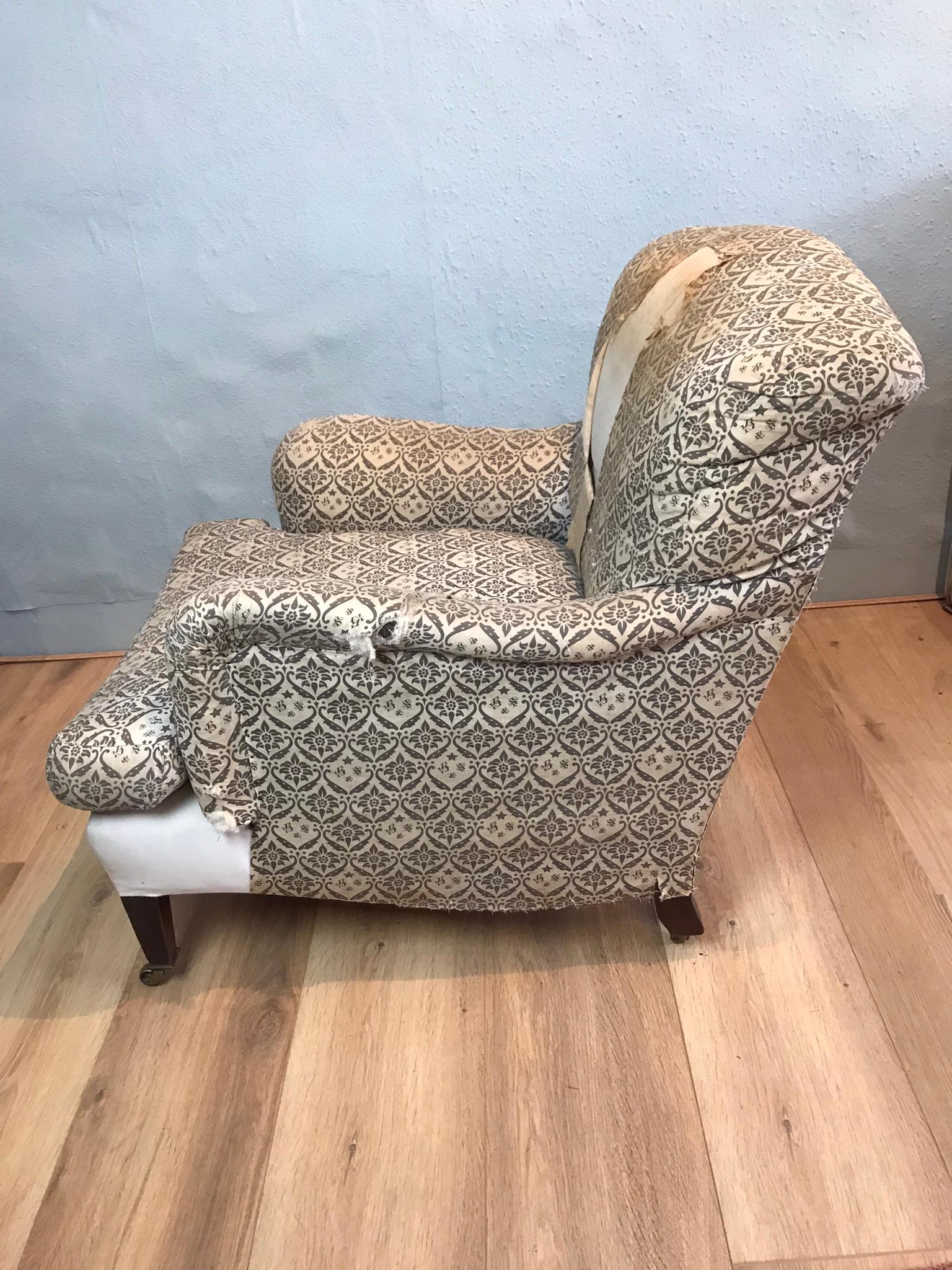 Howard & Sons LTD Bridgewater arm chair retaining It’s original upholstery in H & S monogram ticking, the Bridgewater is one of the most popular models of outstanding quality has what you would expect from Howard and Sons, the rear leg is