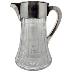 Antigua jarra de agua inglesa "Hukin & Heath" de plata de ley y cristal tallado, ca. 1925