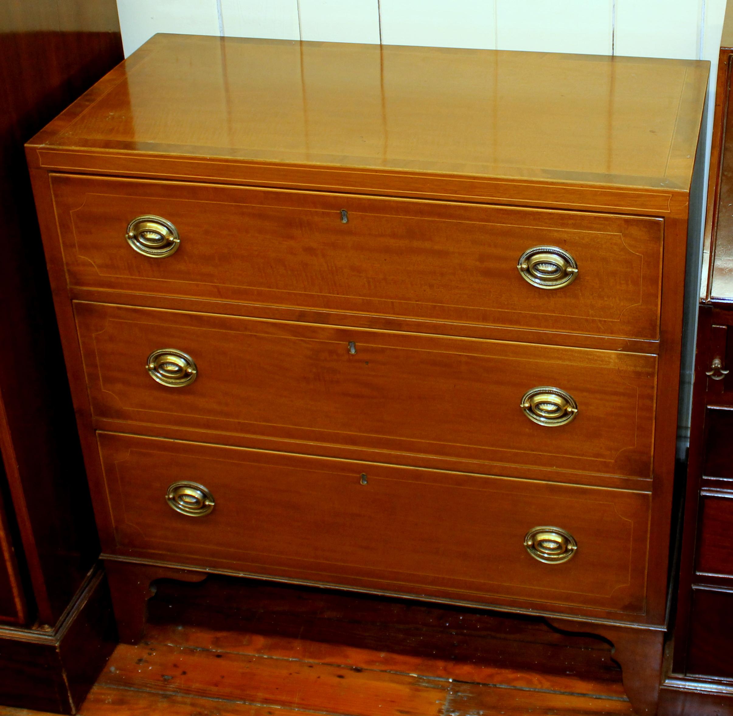 Very fine antique English inlaid mahogany three-drawer chest in a very desirable size and a very desirable 