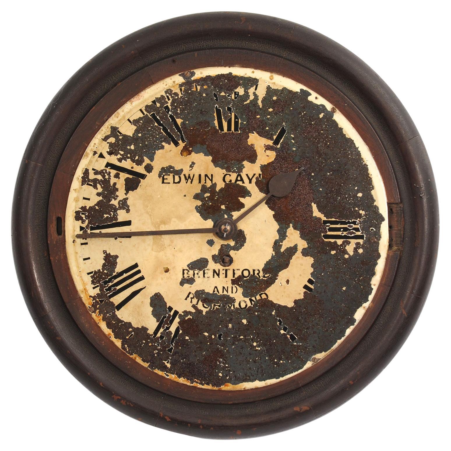 A lovely antique painted iron clock dial signed 'EDWIN GAY**, BRENTFORD and RICHMOND' and dating from circa 1890. As reclaimed by our buyer from a derelict building, it bares the scars of a hard life. Beautifully patinated with paint loss, scratches