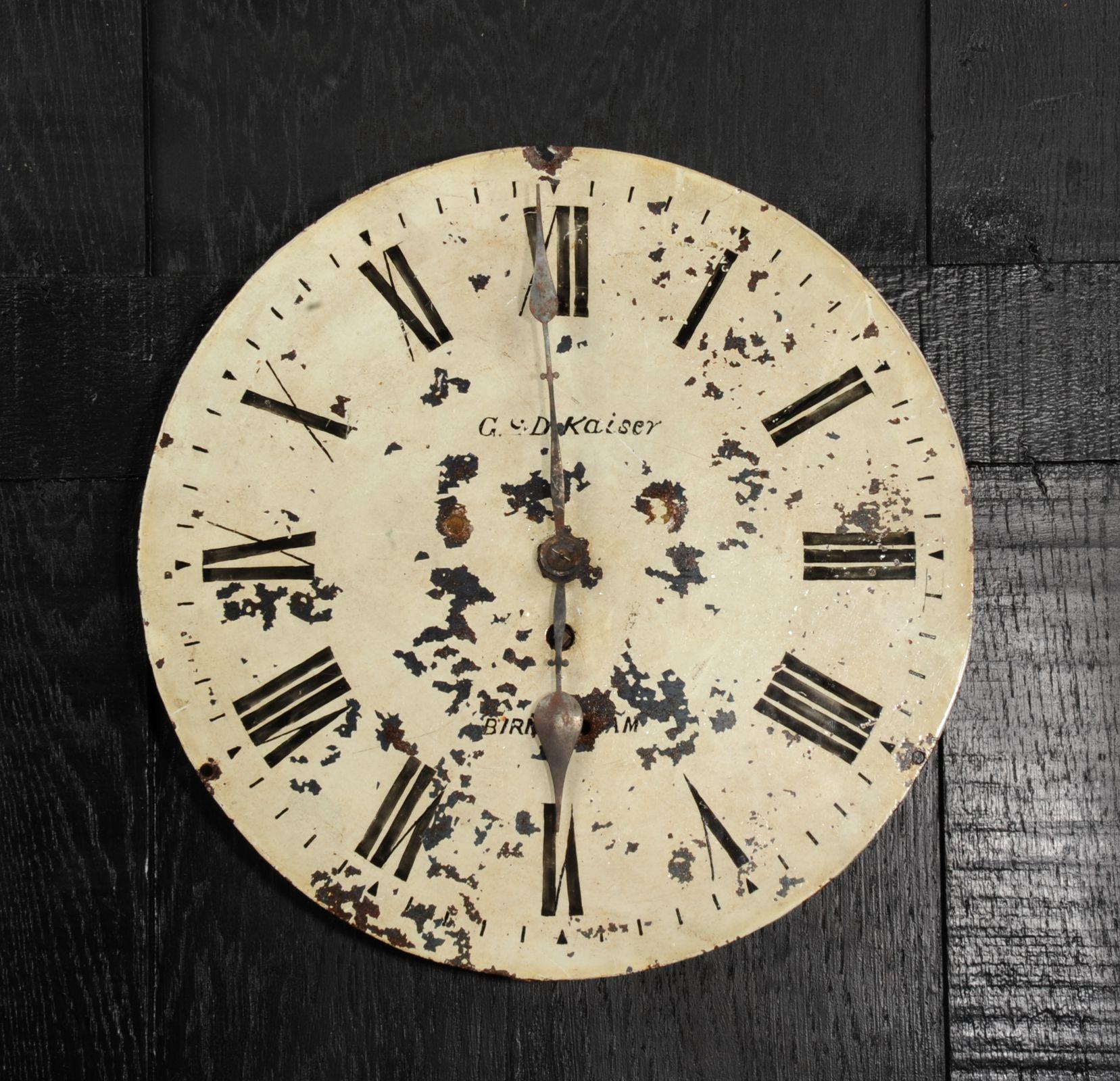 A lovely antique English iron clock dial dating from circa 1880. Reclaimed from the workshop of a crumbling works by our buyer, it bears the scars of a hard life. Beautifully patinated with an ancient craquelure, paint loss and rust. The fine, once