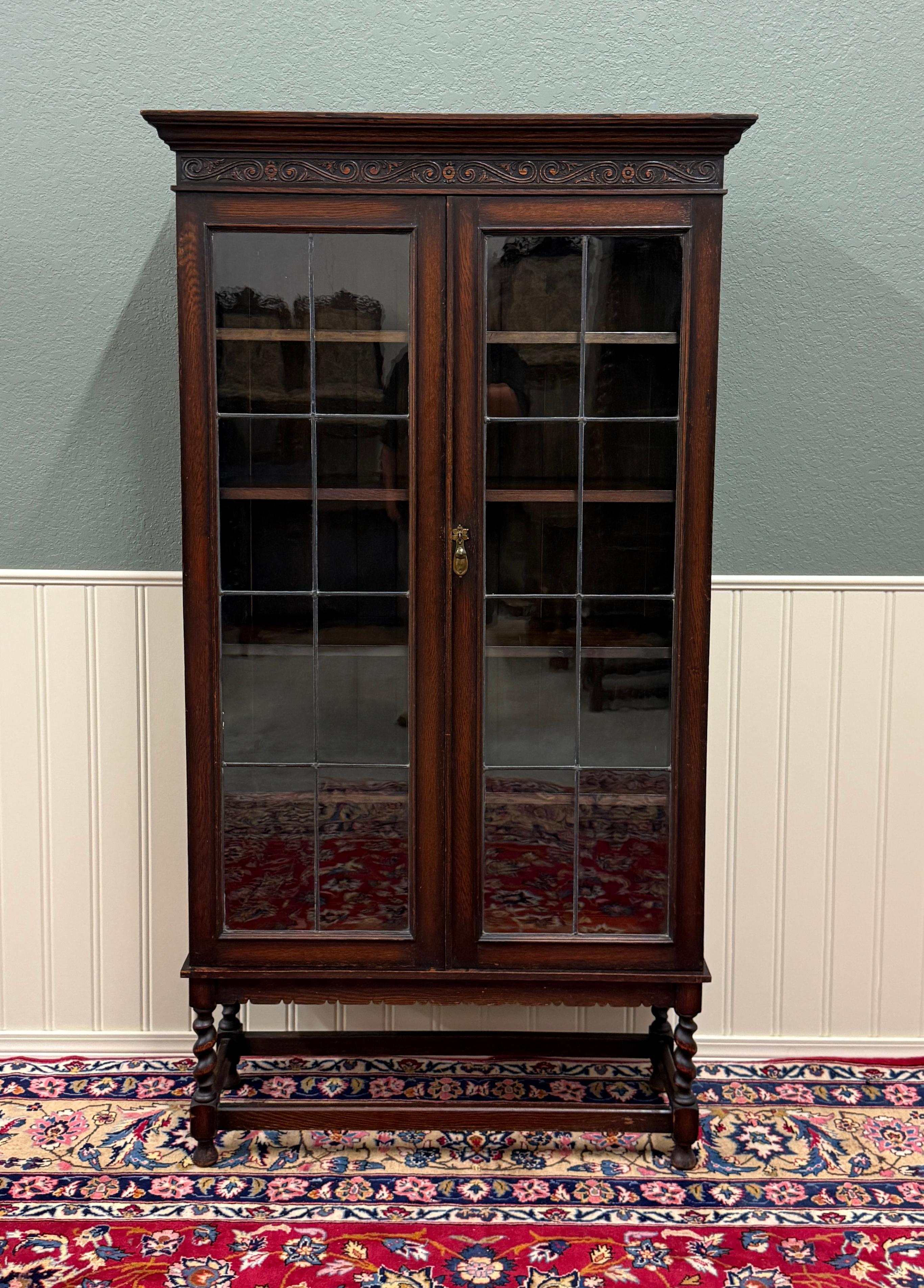 BEAUTIFUL Antique English Jacobean Oak Bookcase or Display Cabinet with Double Full Length Leaded Wavy Glass Doors and Barley Twist Legs~~c. 1920s

PERFECT for your favorite antique books or collectibles

74