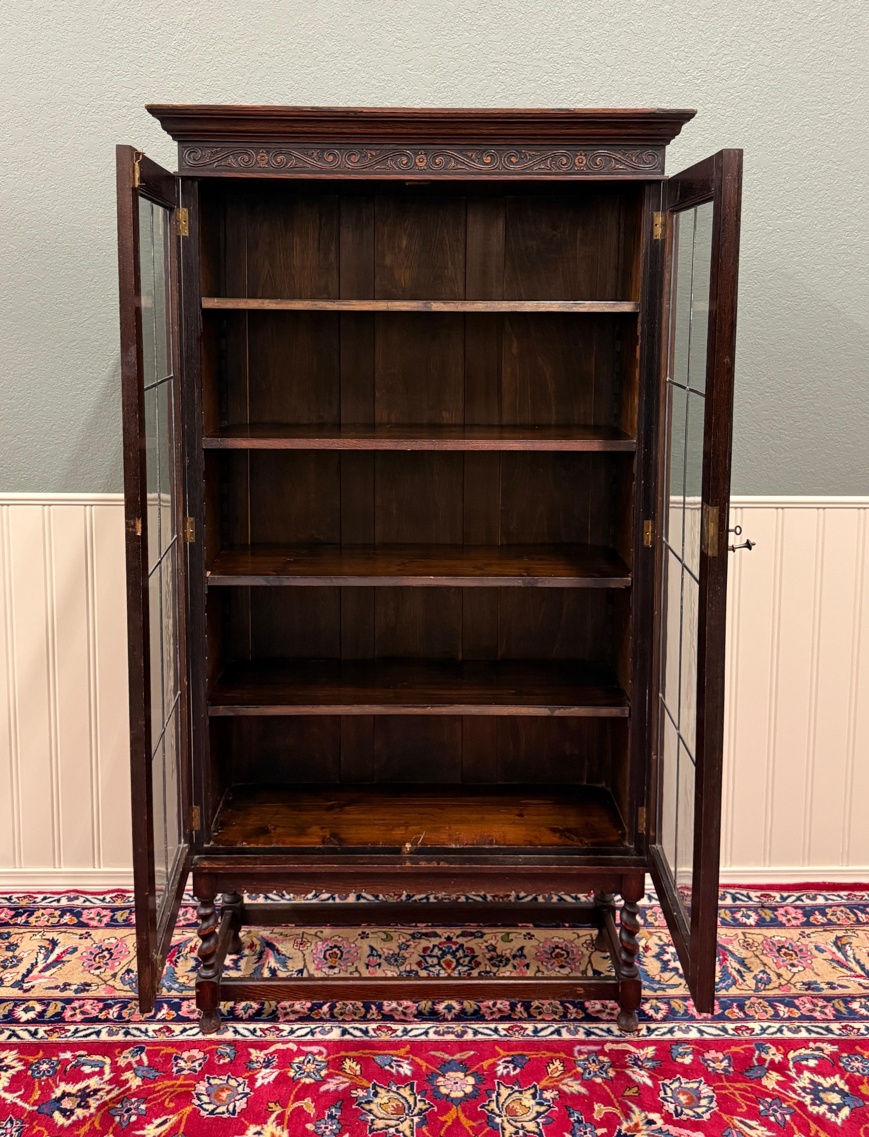 Carved Antique English Jacobean Bookcase Bookshelf Display Cabinet Leaded Glass Oak For Sale