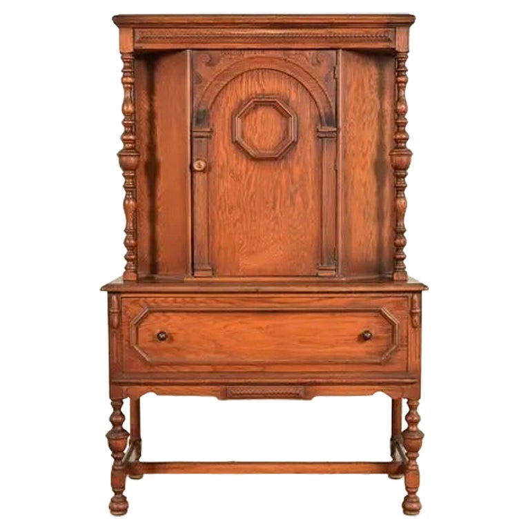 Antique English Jacobean Carved Oak Bar Cabinet, Circa 1920s
