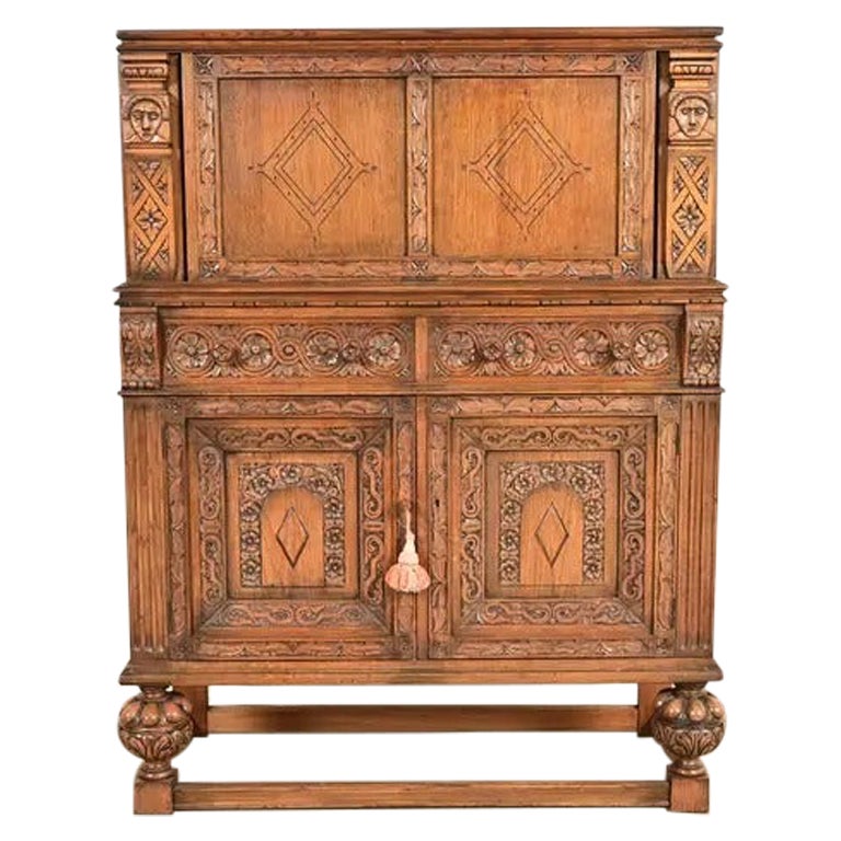 Antique English Jacobean Carved Oak Bar Cabinet, Circa 1920s