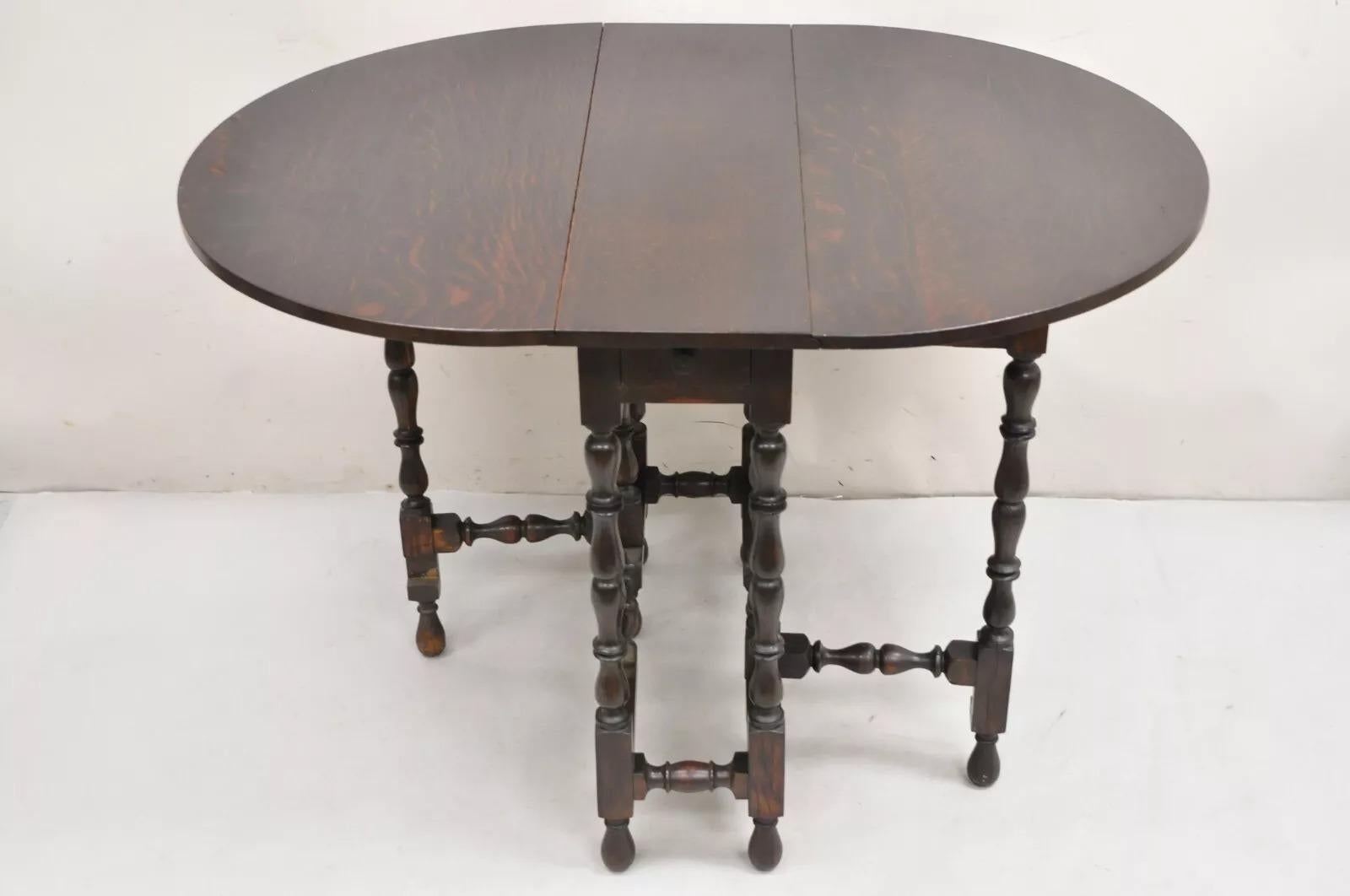 20th Century Antique English Jacobean Oak Wood Barley Twist Small Oval Drop Leaf Table