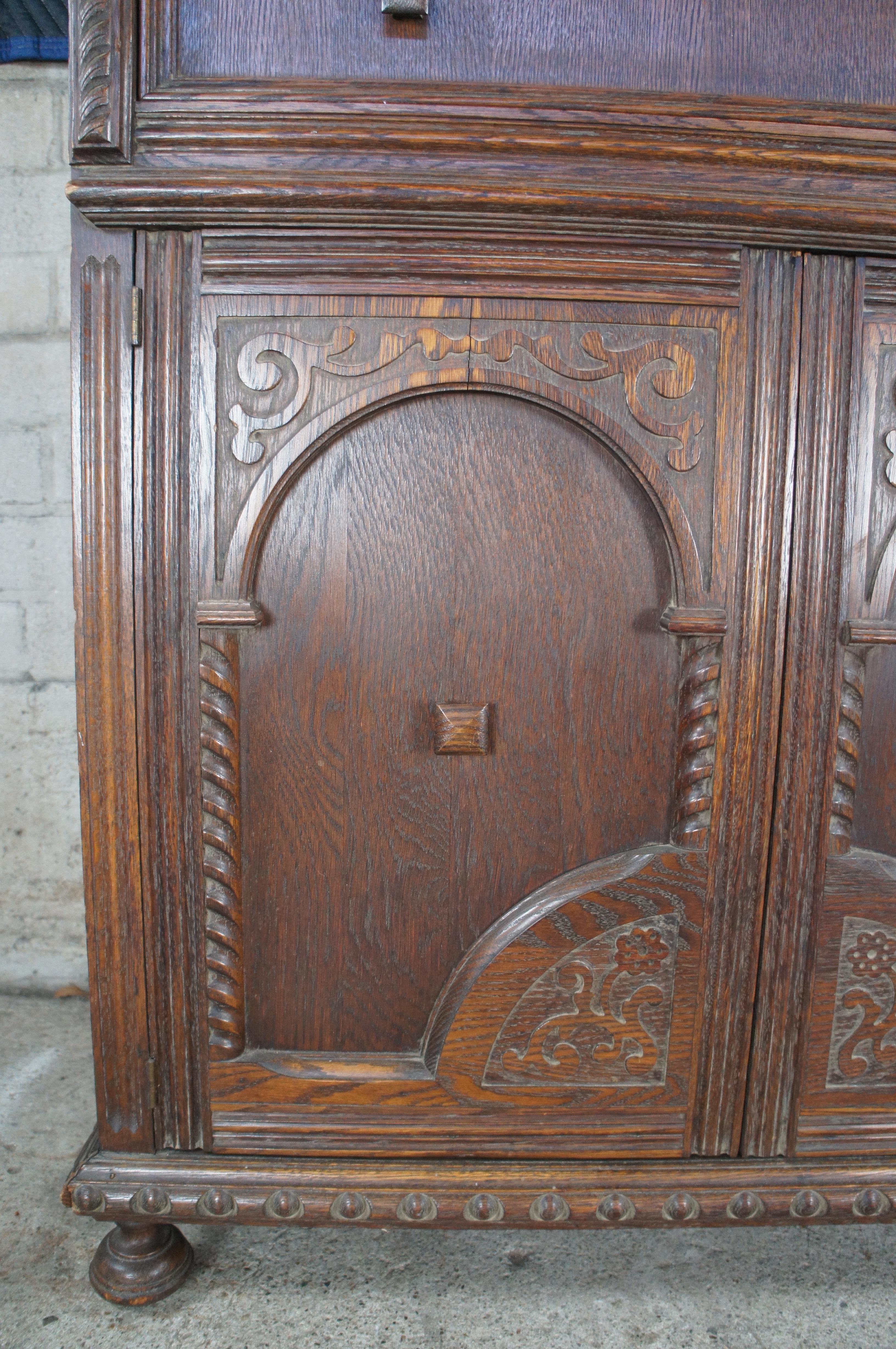 Early 20th Century Antique English Jacobean Style Carved Oak Court Cupboard Hutch Sideboard Dry Bar For Sale