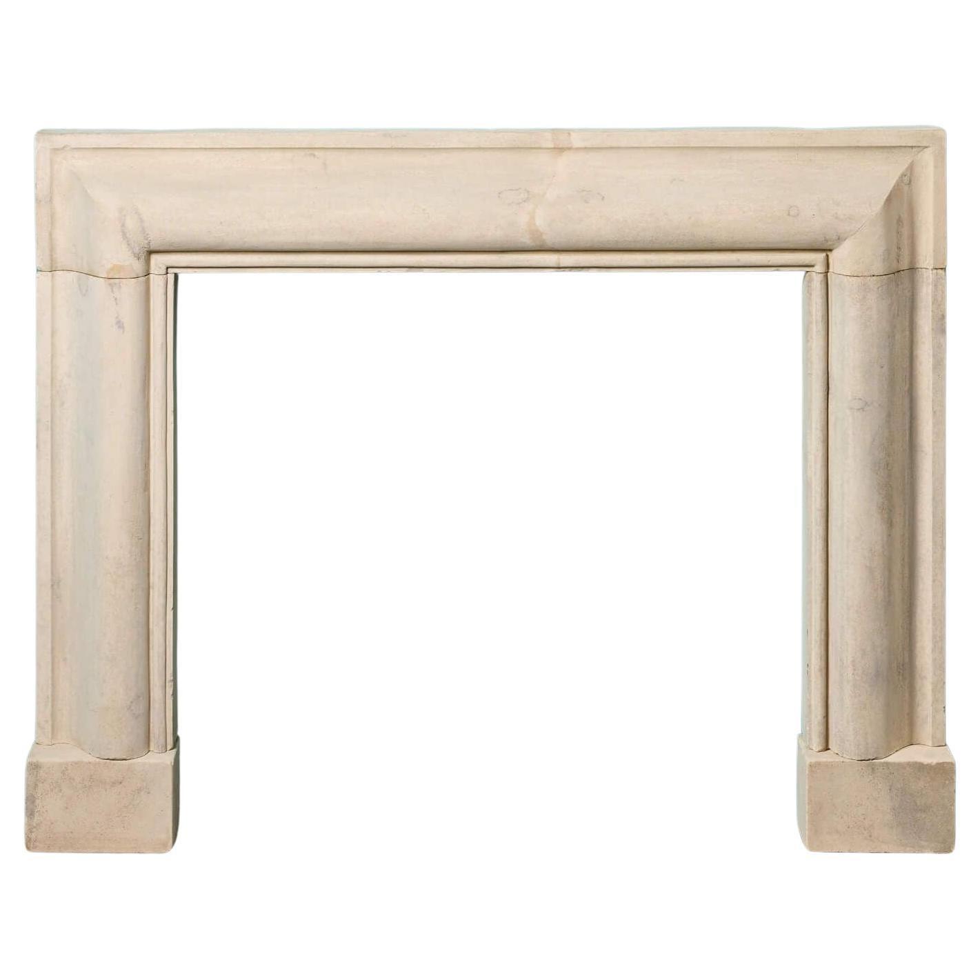 Antique English Limestone Bolection Fireplace For Sale