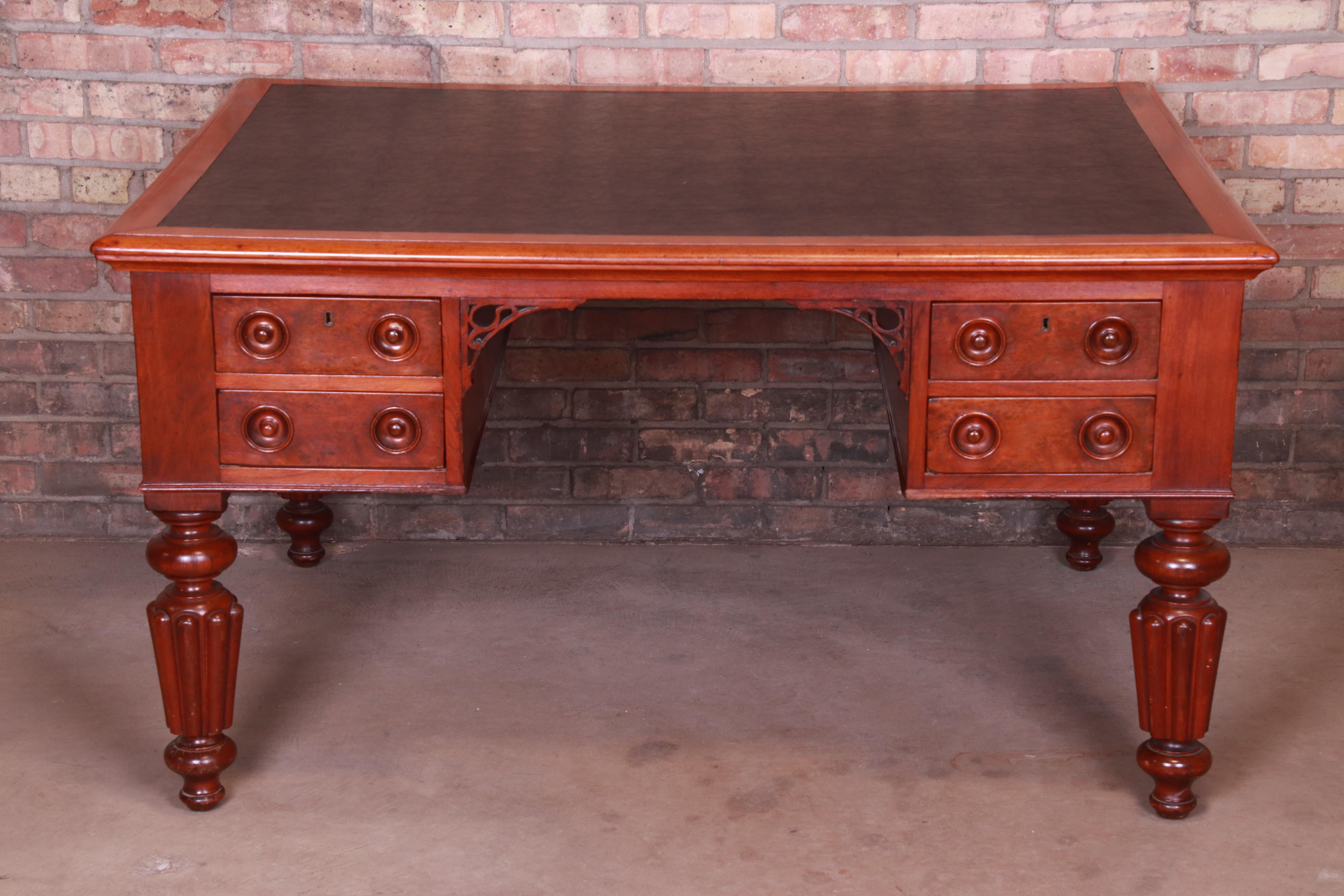 Chippendale Antique English Mahogany and Burl Executive Leather Top Partner Desk, circa 1850