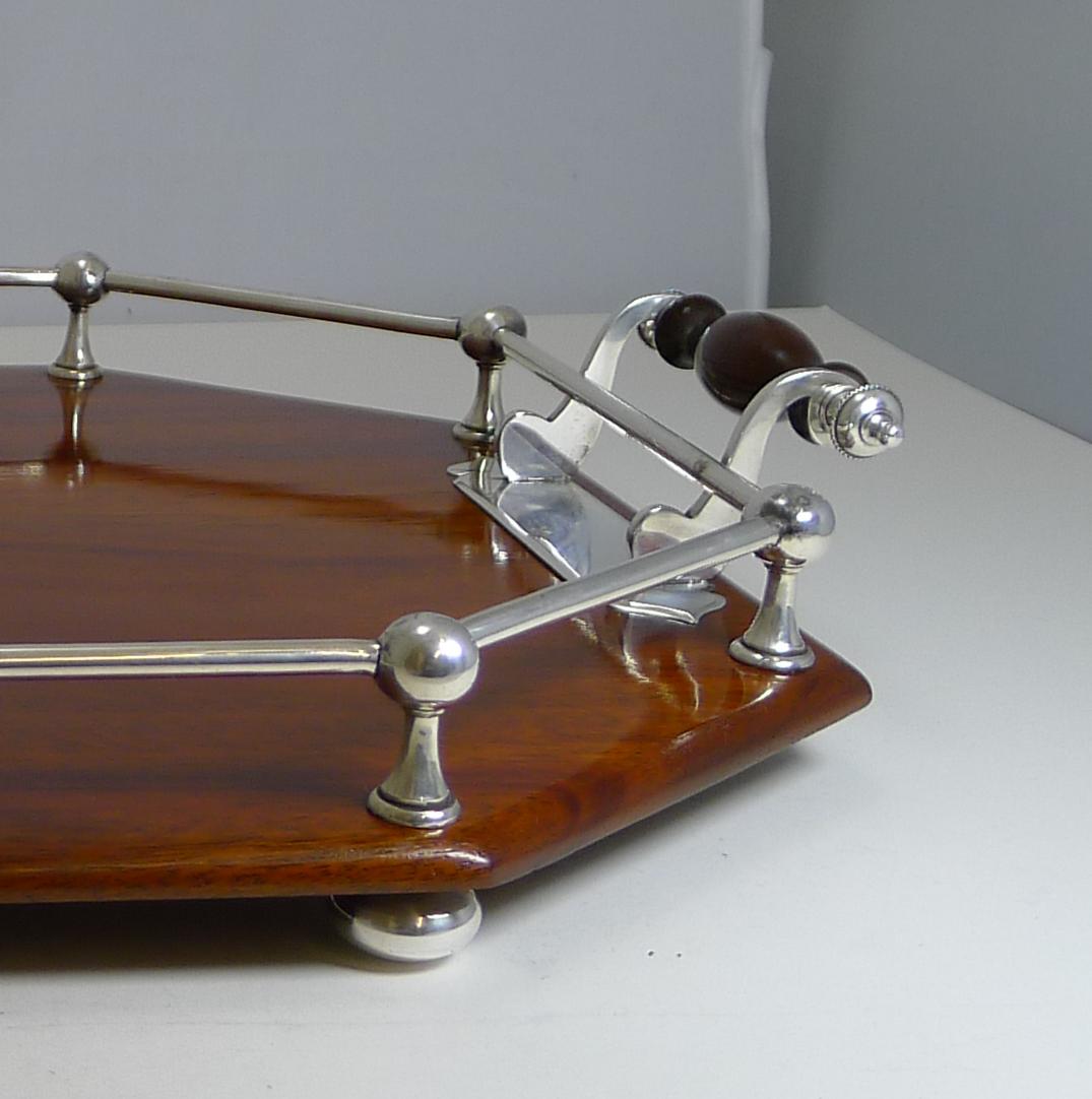 A most handsome late Victorian / early Edwardian cocktail / serving tray, creates a great look for your drinks display paired together with other complimentary pieces.

Made from solid Mahogany and standing on four original bun feet. The tray has